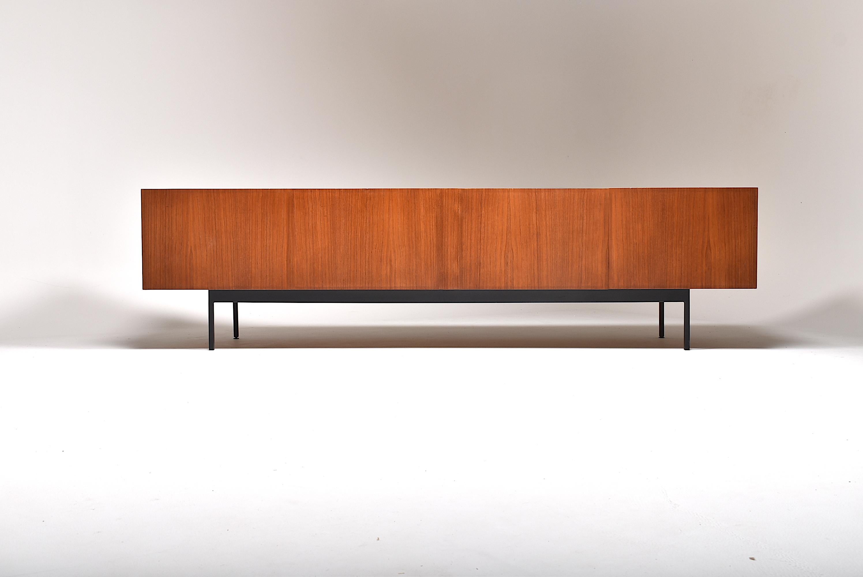 Rare b40 teak sideboard by Dieter Waeckerlin for Idealheim Basel.
This is the longest version with 262cm, made in Switzerland, Basel, in the 50s.
Very beautiful proportions, based on Le Corbusier's modulor.
High quality manufacturing. 
It