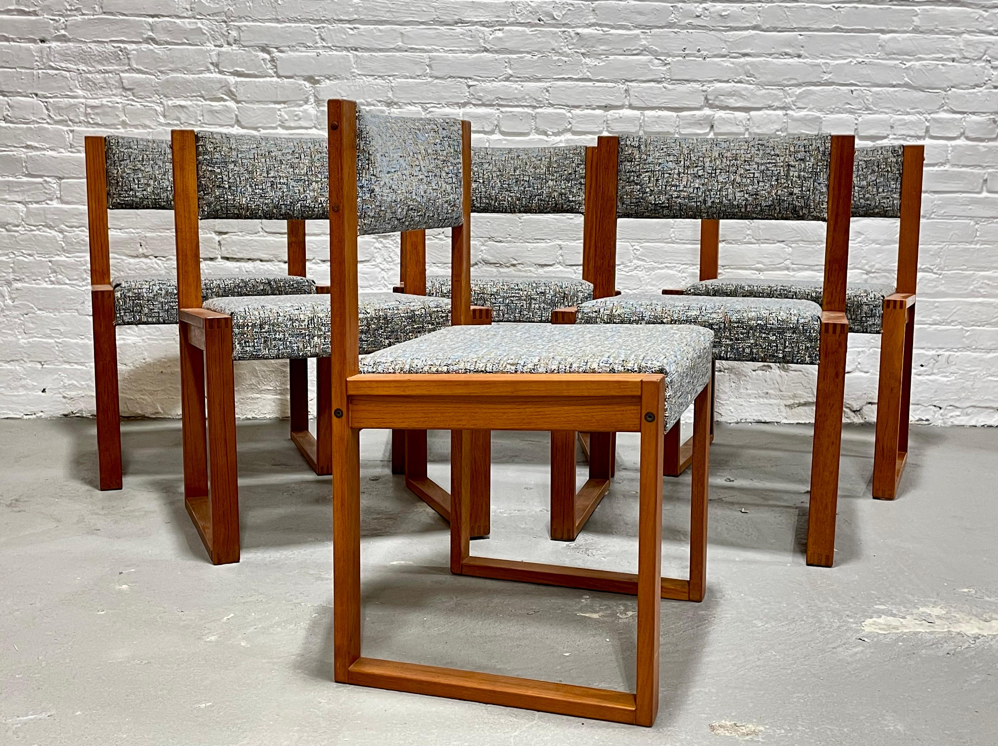 Rare set of six Teak Mid Century Modern DANISH Dining Chairs, c. 1960's.  The solid wood frames have the best straight lines with dovetailed detailing. There is a slight curve to the backrests which is not only visually stunning but also provides a