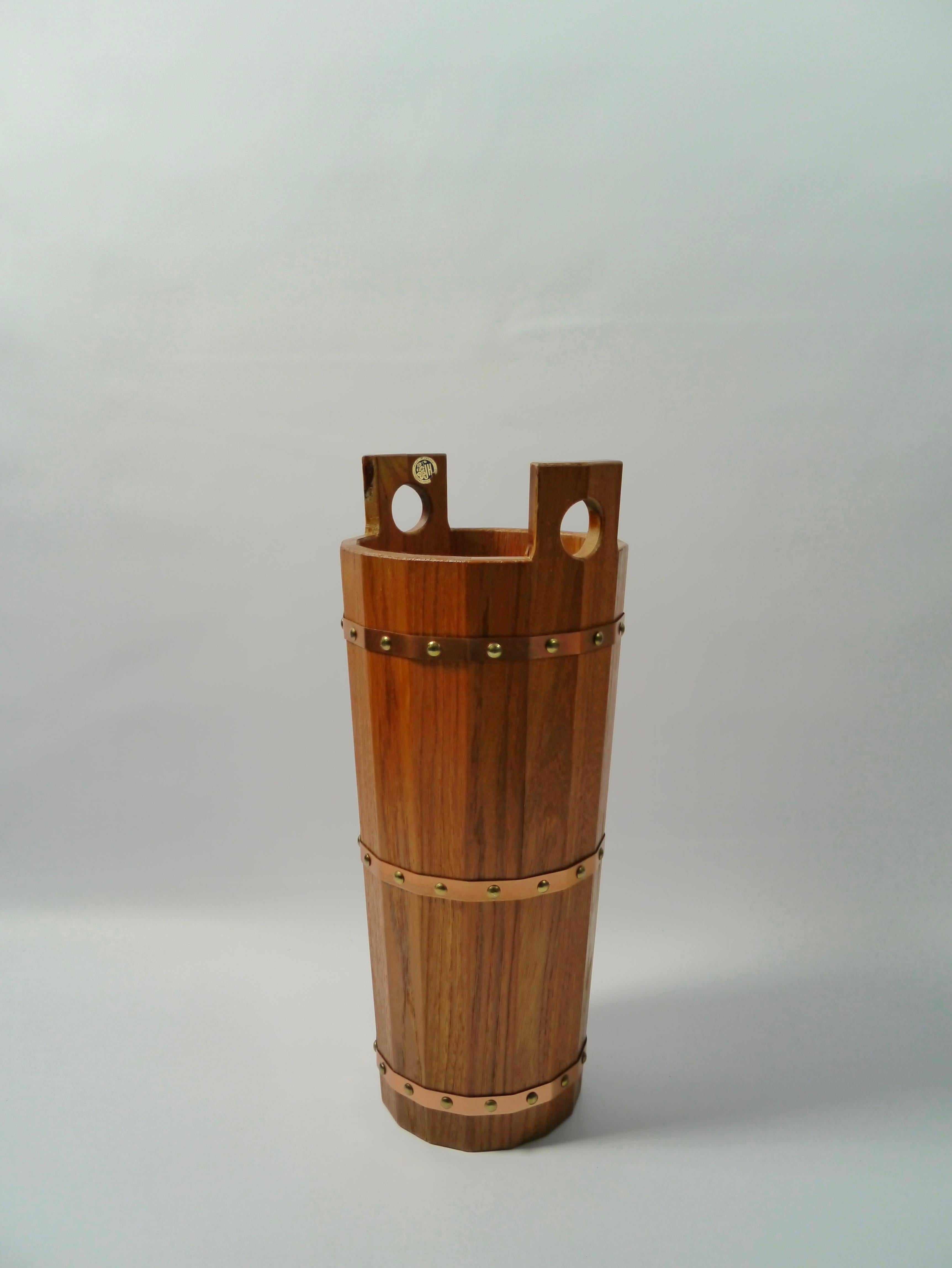 Mid-Century Modern umbrella holder / stand produced by JH Fabrikerna in Sävsjö Sweden, 1950s. Made out of massive teak staves and copper hoops and rivets, mimicking a wine barrel construction.