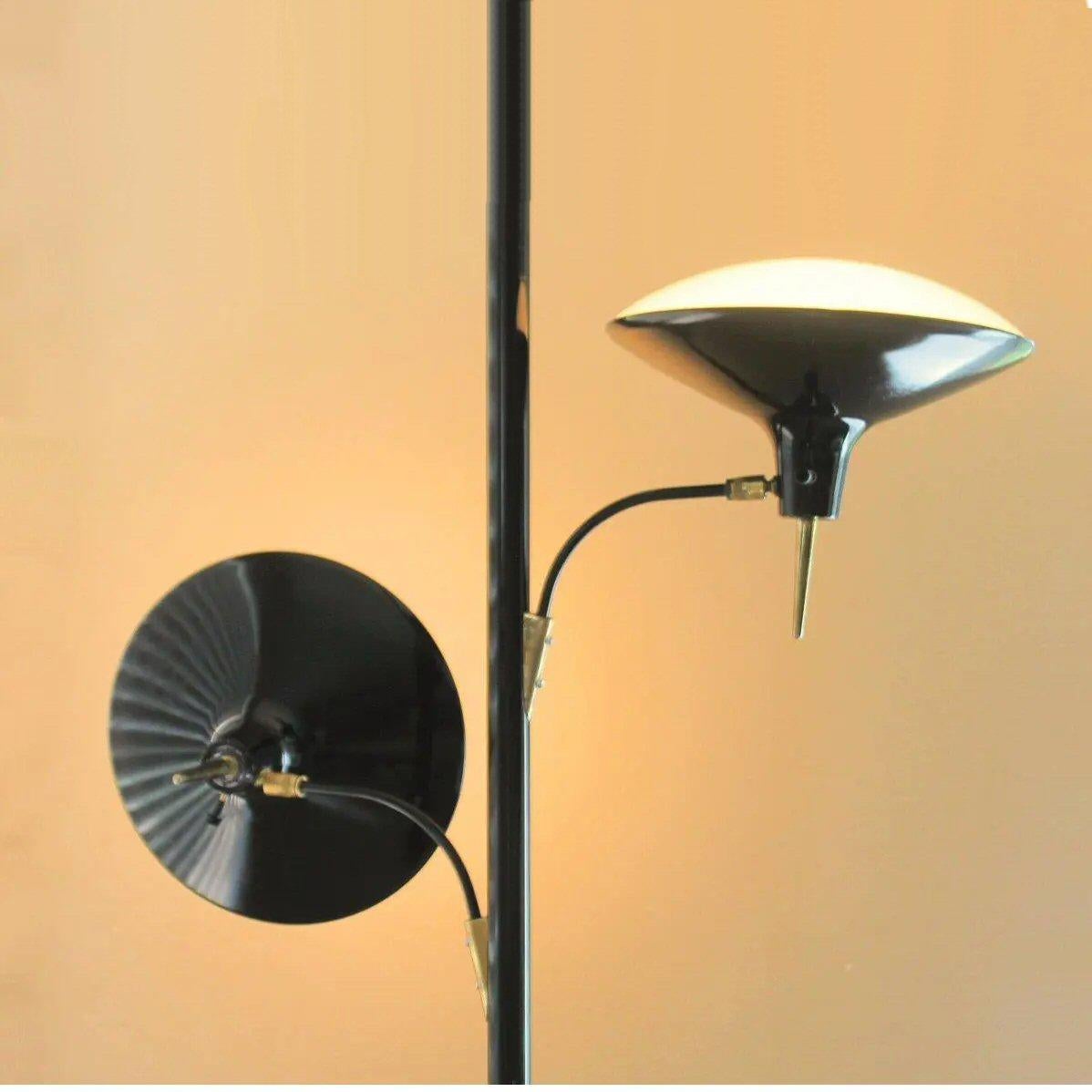 This MAGNIFICENT Mid Century Tension Pole Lamp is the legendary Laurel Saucer design!

The saucer design is iconic. Flying saucers were all the rage in the fifties and sixties.  This design gave people their own 'flying saucer' lamp!  

It cuts a