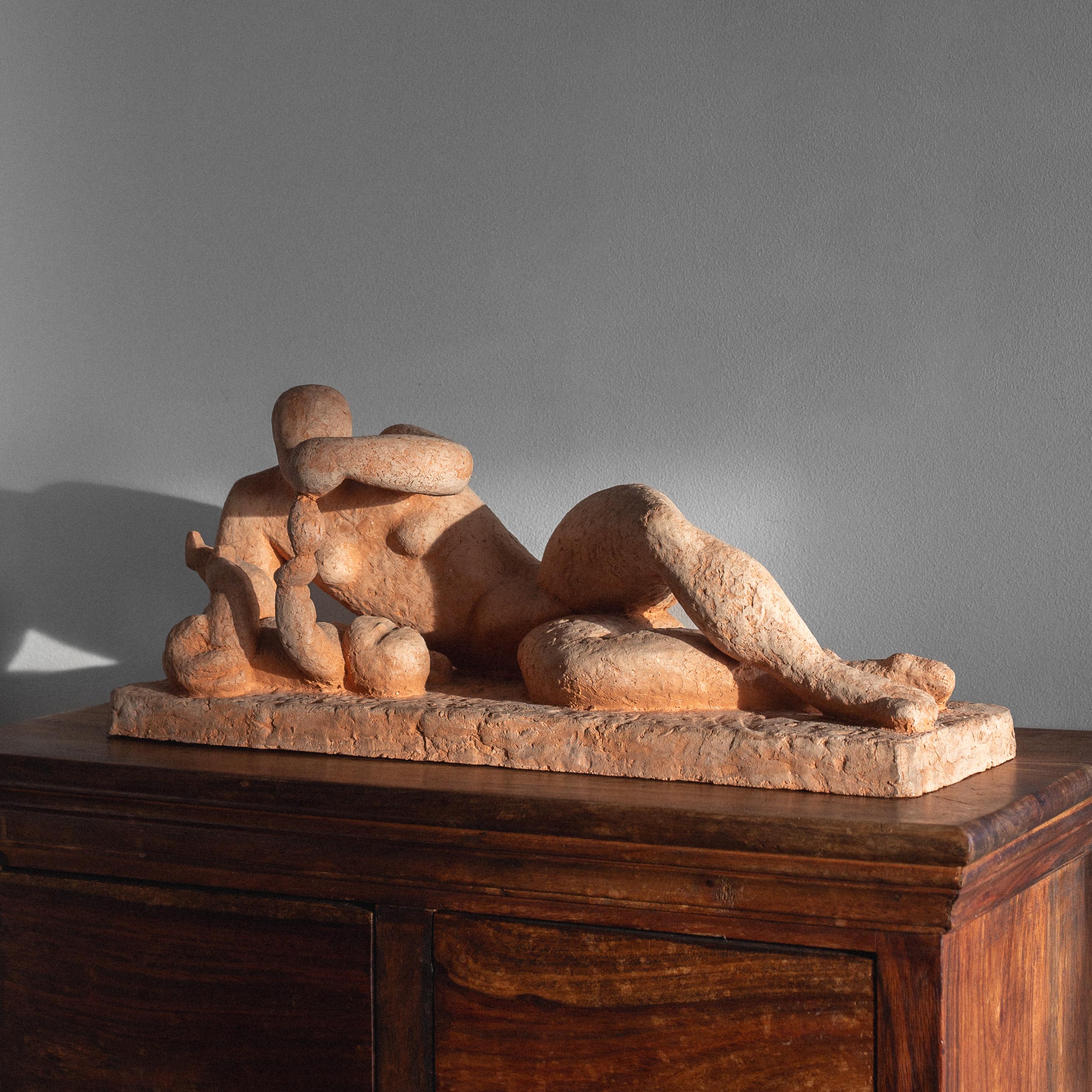 Rare and evocative Swedish Modernist sculpture by renowned sculptor Bengt Amundin (1915-2011), depicting an intimate moment between a reclining adult figure and child. Hand-crafted in unglazed terracotta with a warm, natural patina that highlights