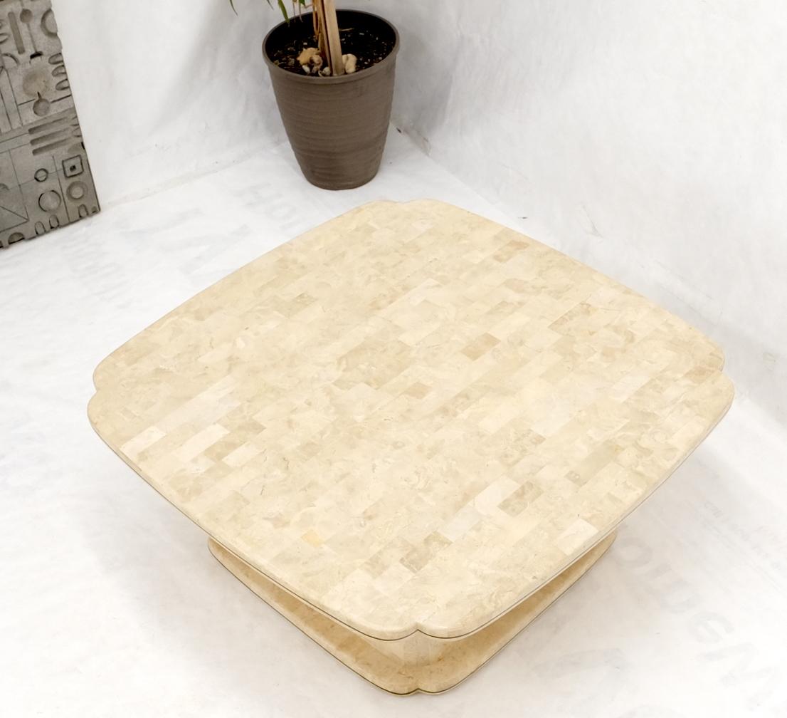 Mid-Century Modern tessellated stone single pedestal square coffee table.