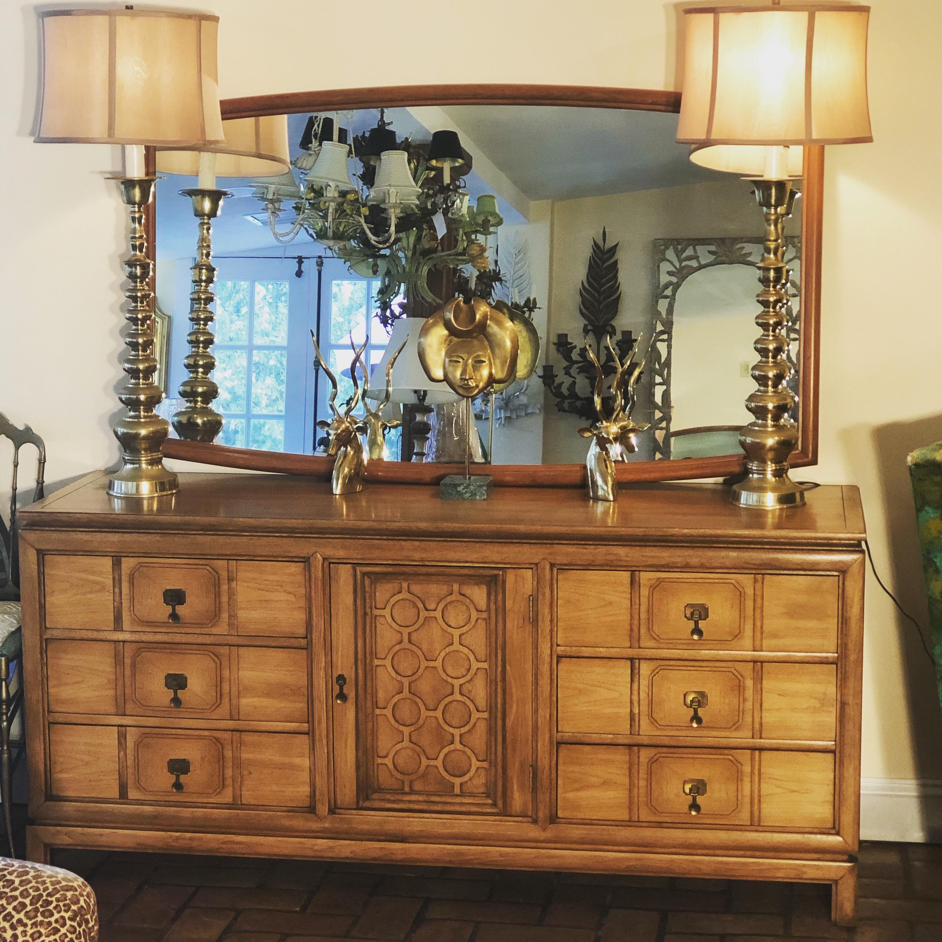 Mid-Century Modern Thomasville Tamerlane dressser. Stylish geomteric patterned dresser with lots of storage. Nine drawers total. 3 large drawers on either side and three small drawers in the middle section. Extremely well built solid wood dresser.