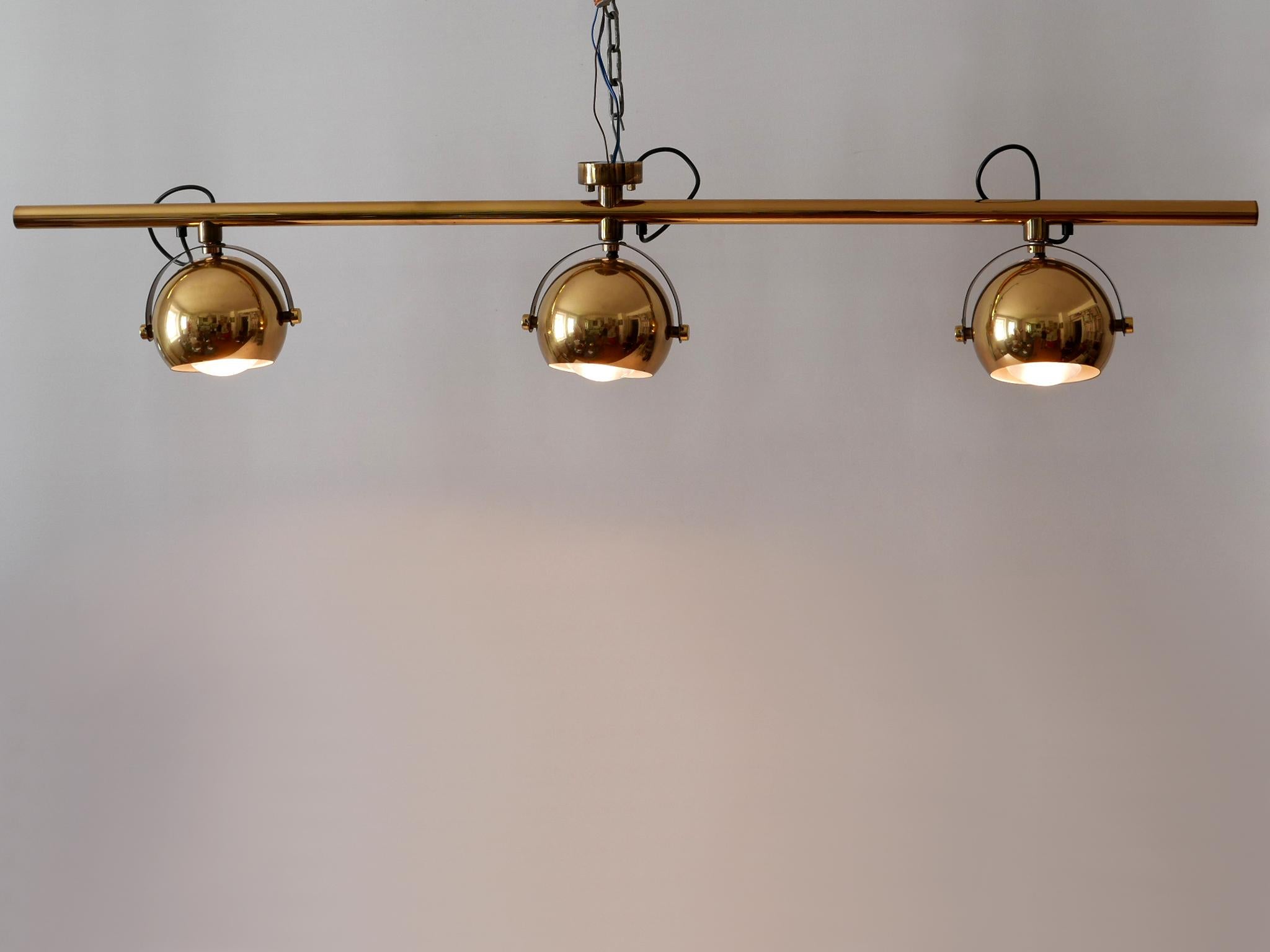 Rare Mid-Century Modern ceiling fixture or spot. The diffusors are adjustable. Designed and manufactured by Sische Simon and Schelle, Germany, 1960s.

Executed in brass, the lamp comes with 3 x E27 / E26 Edison screw fit bulb holders, is wired and