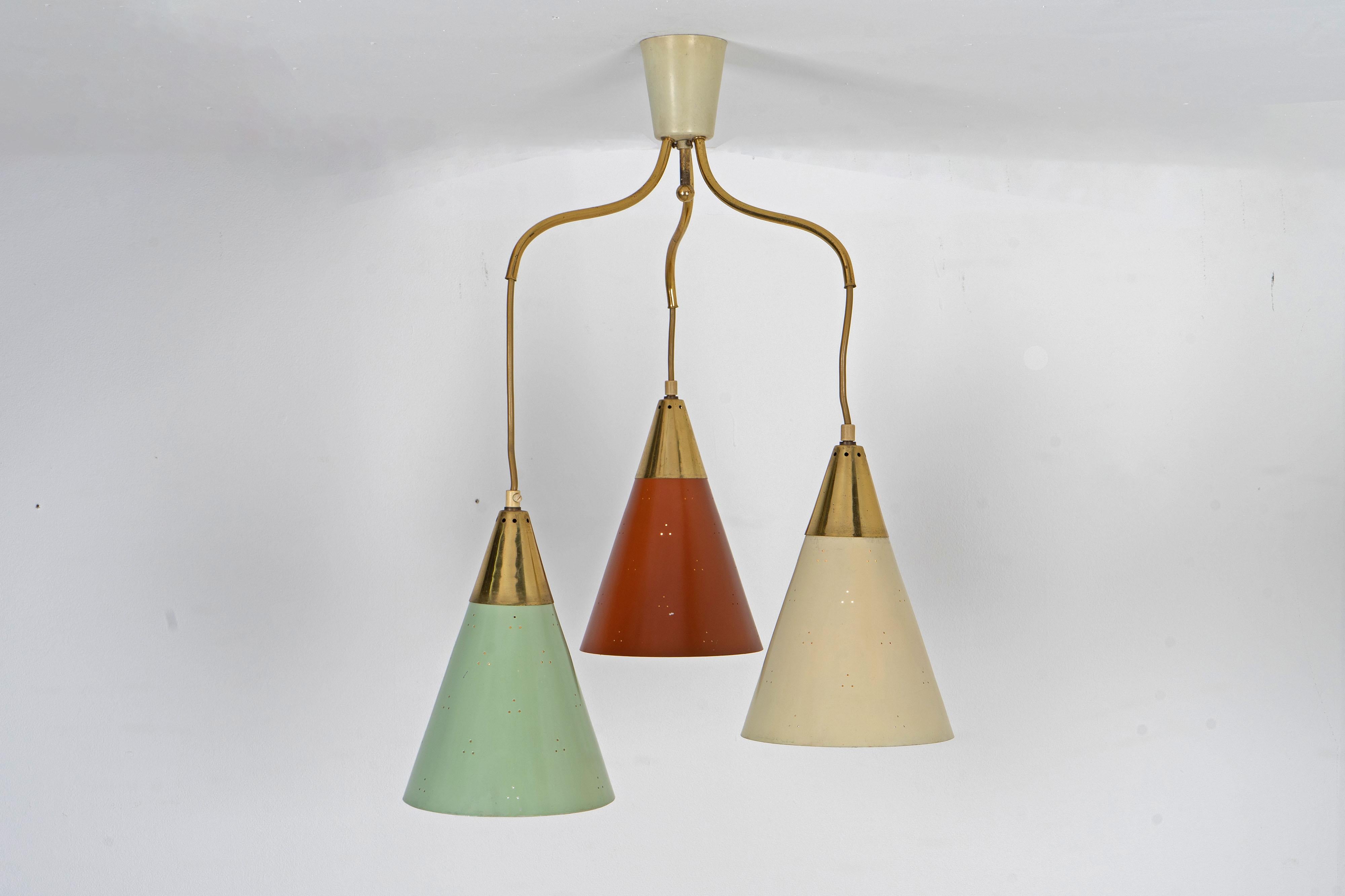 Beautiful mid-century chandelier from the 1950s in the style of Paavo Tynell, Kalmar etc. Multi-coloured shades, which can be dropped to different heights.