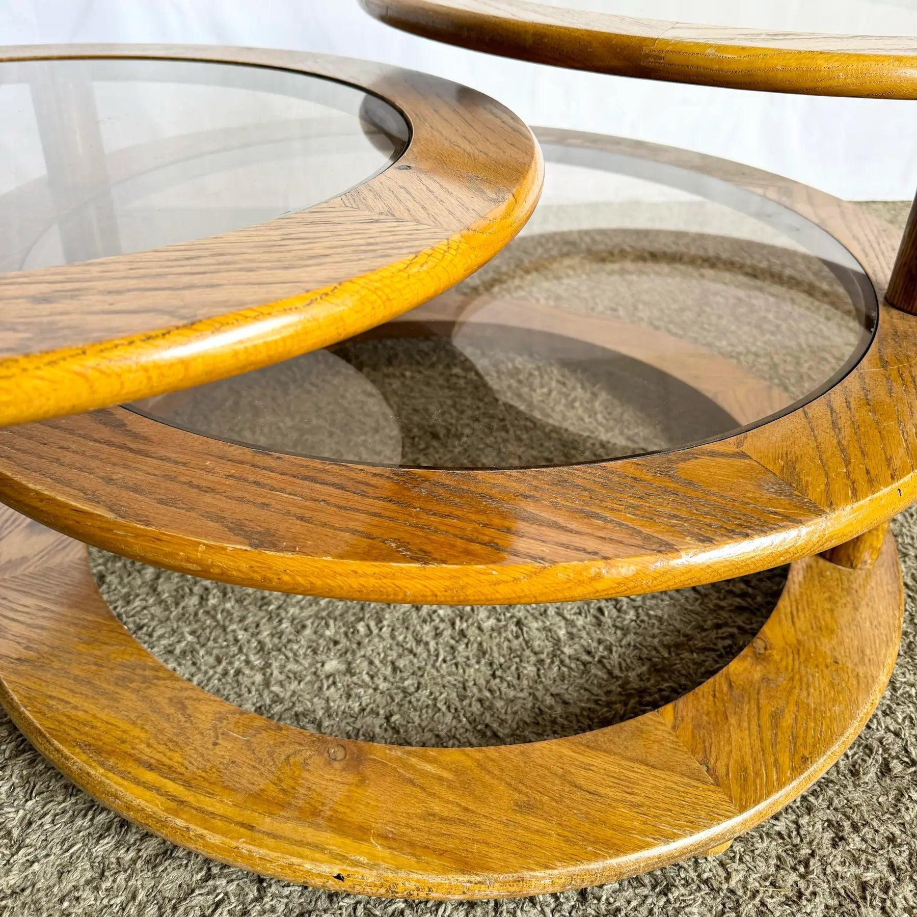 Late 20th Century Mid Century Modern Three Tier Oak and Smoked Glass Swivel Coffee Table For Sale