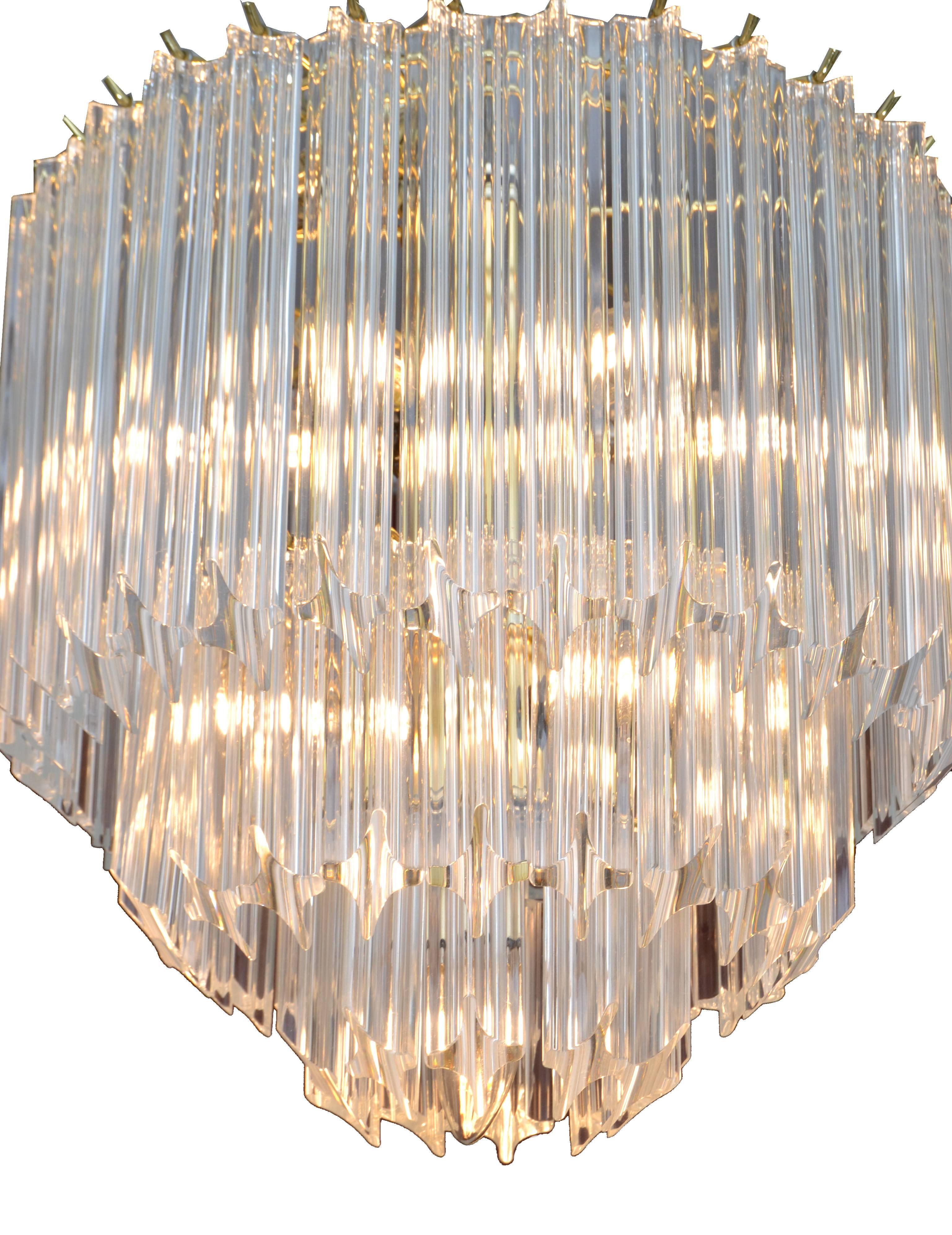 Mid-Century Modern Three Tiers Brass and Lucite Chandelier In Excellent Condition In Miami, FL