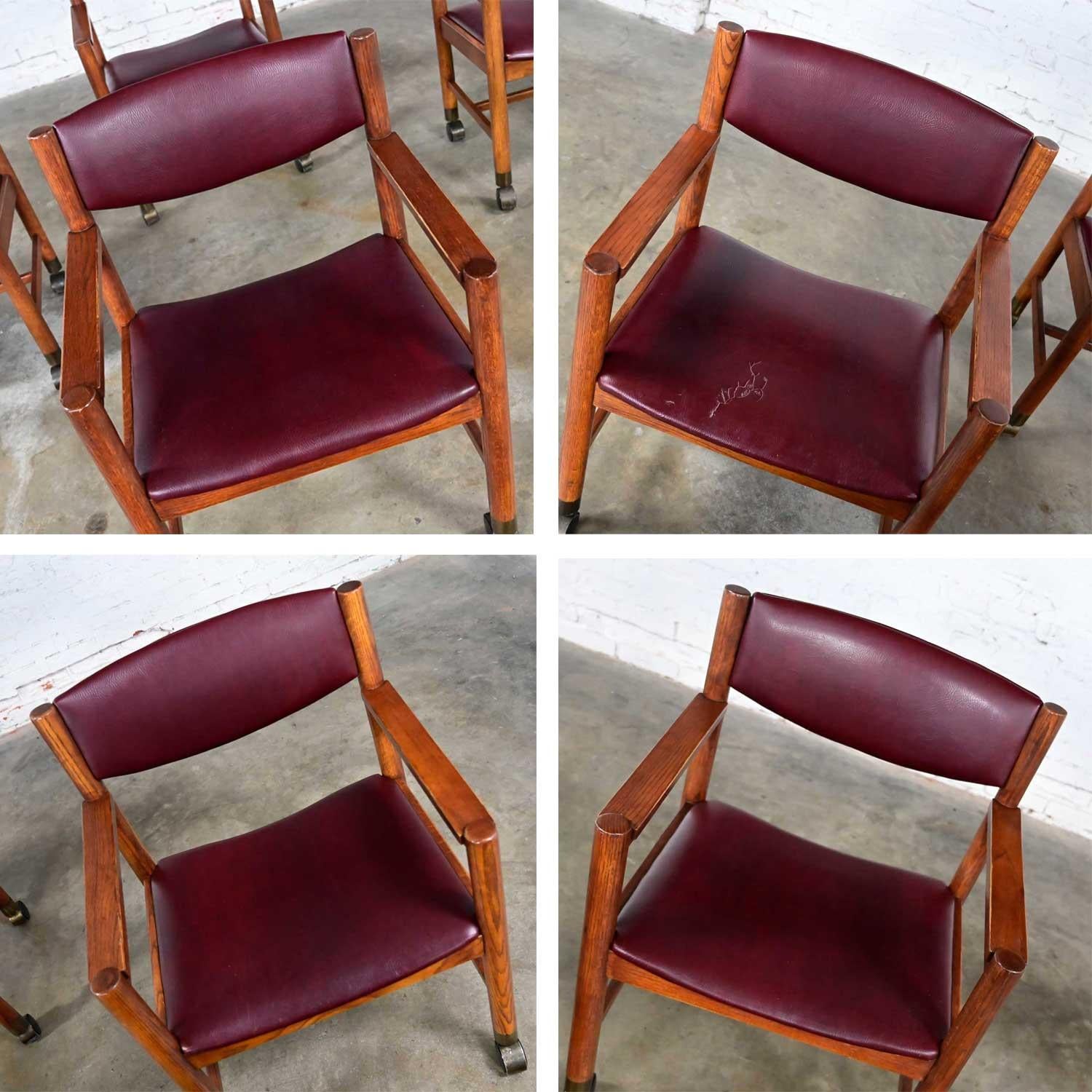 Mid-Century Modern to Modern Oak Maroon Vinyl Rolling Game or Dining Chairs For Sale 5