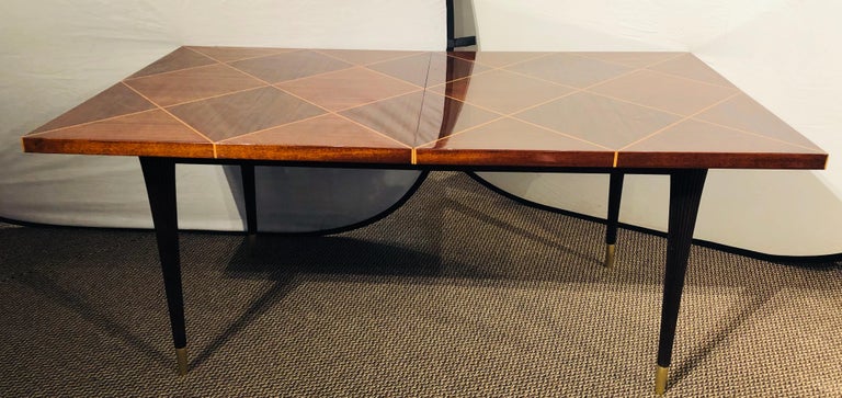American Mid-Century Modern Tommi Parzinger Tagged Dining Table with Two Leaves For Sale