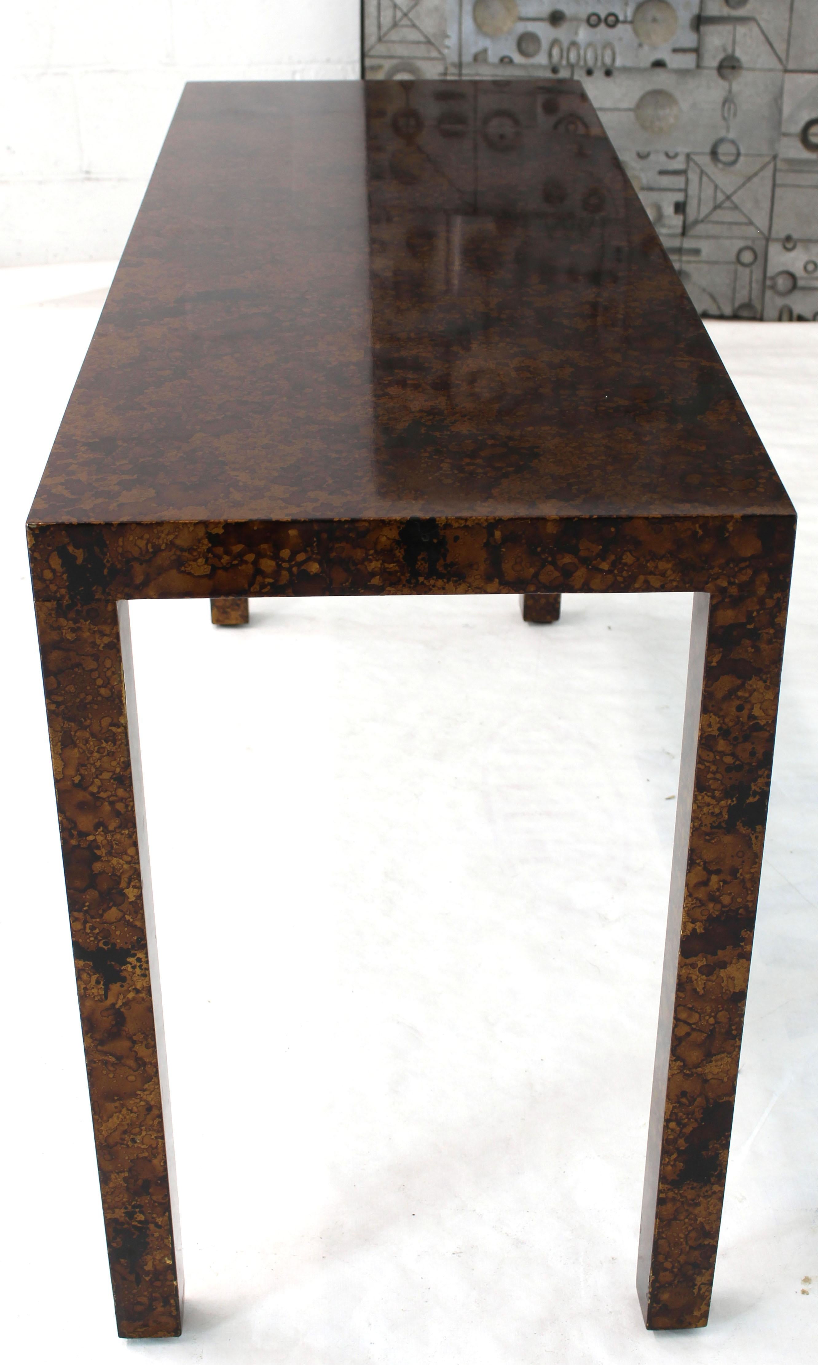 Mid-Century Modern tortoise medium gloss finish console table.
  