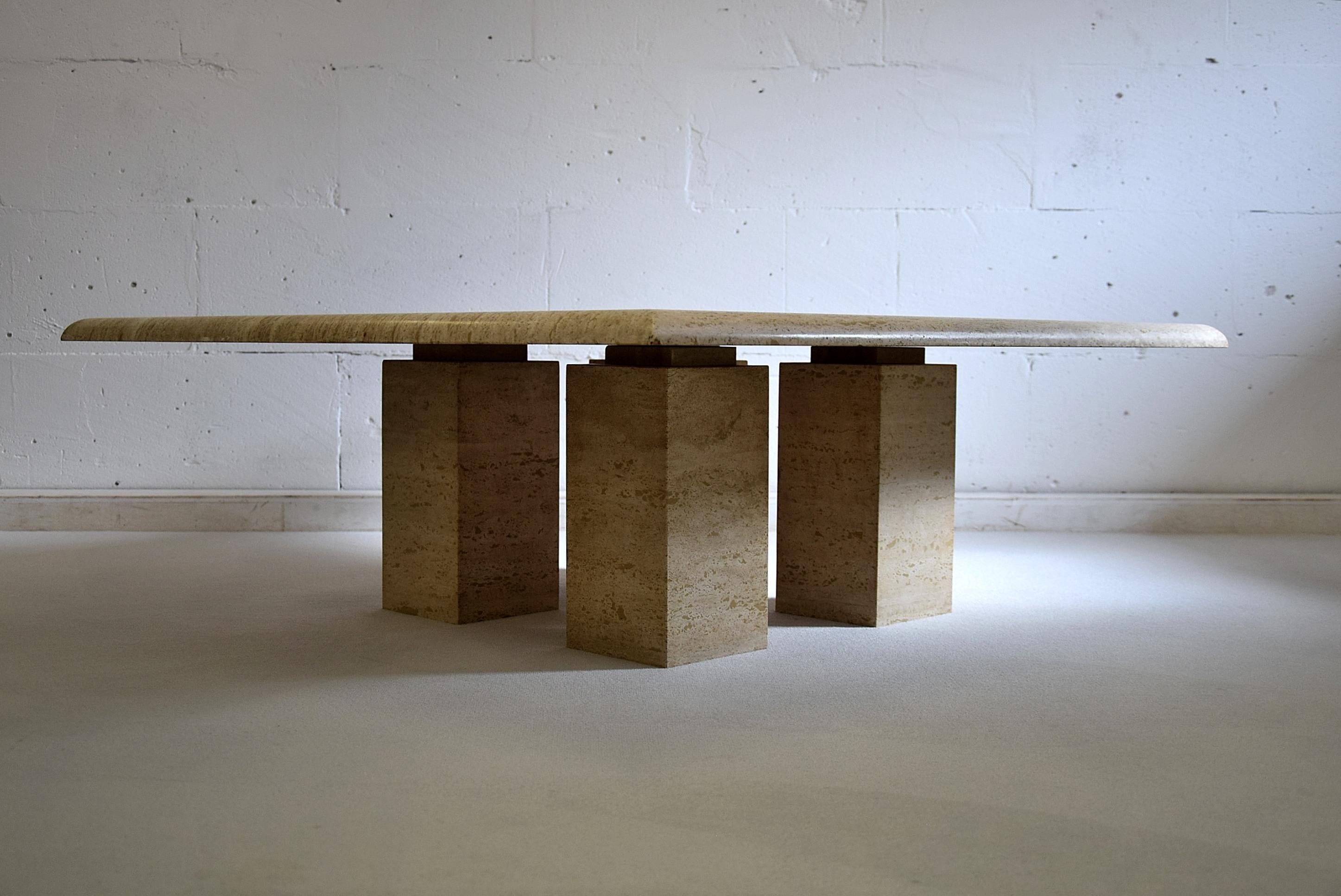 Gorgeous and stylish Travertine Mid-Century Modern coffee table in fantastic condition. The 4 square Travertine legs can be positioned as you please. In the center as we did or at the corners if you prefer.
Travertine is a form of limestone