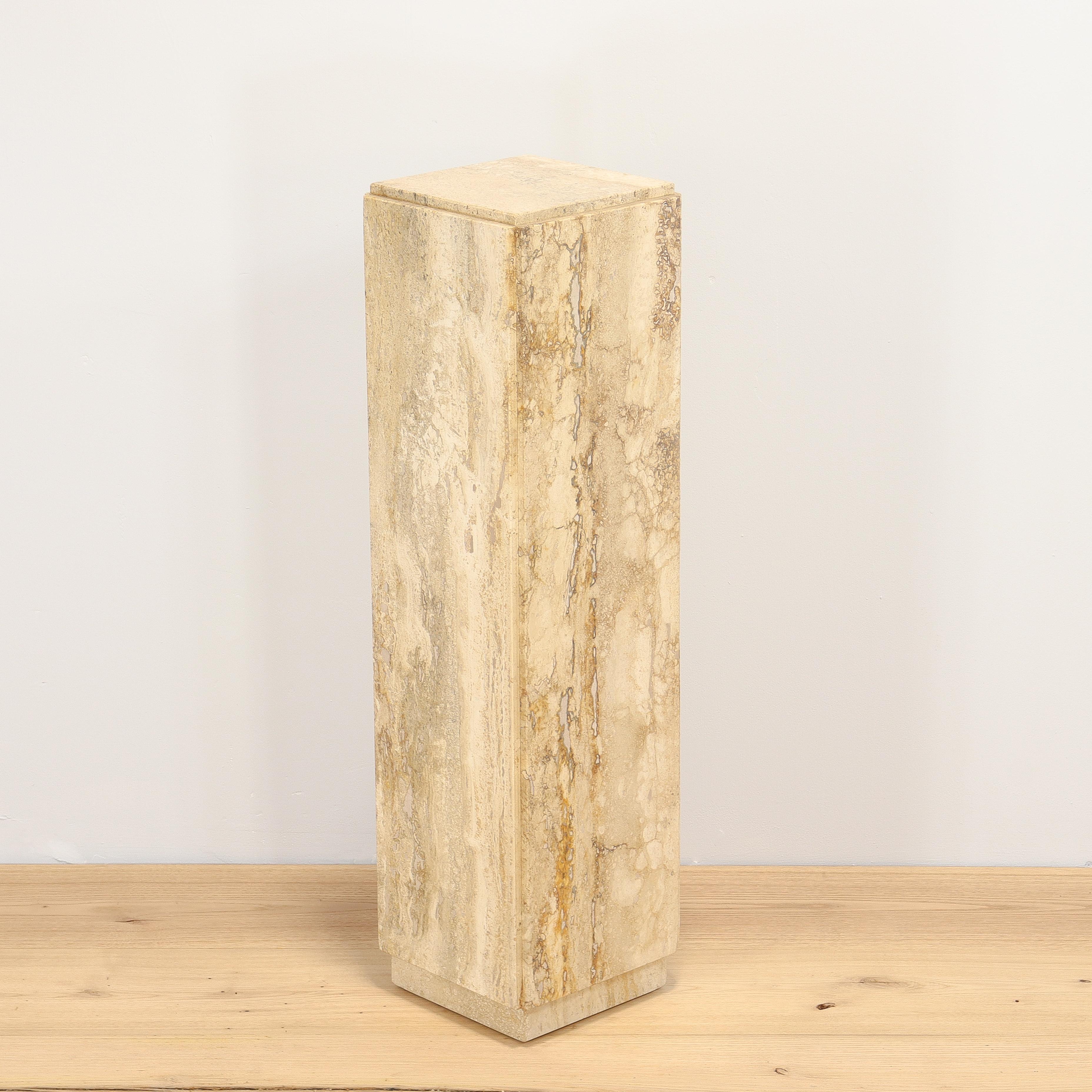 A fine Mid-Century Modern travertine pedastal.

With chamfered panels to each side, a rich variegation to the stone, and a smooth polished surface.

Simply great midcentury design!

Date:
1970s

Overall Condition:
It is in overall good, as-pictured,