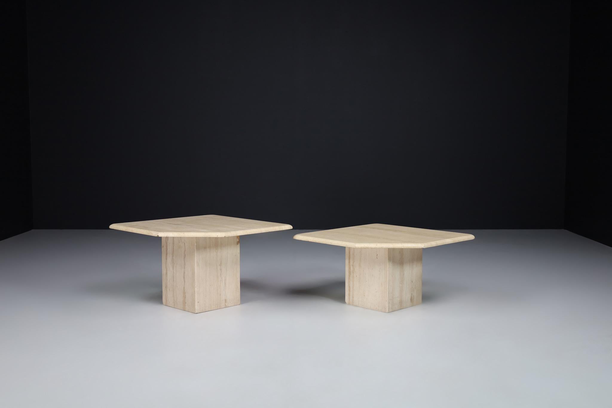 Mid-Century Modern Travertine side or end tables, Italy 1970s

This beautiful set of post-modern travertine side - coffee tables, circa the 1970s, has beautiful graining and a pentagonal top. This sculptural travertine side table would work great
