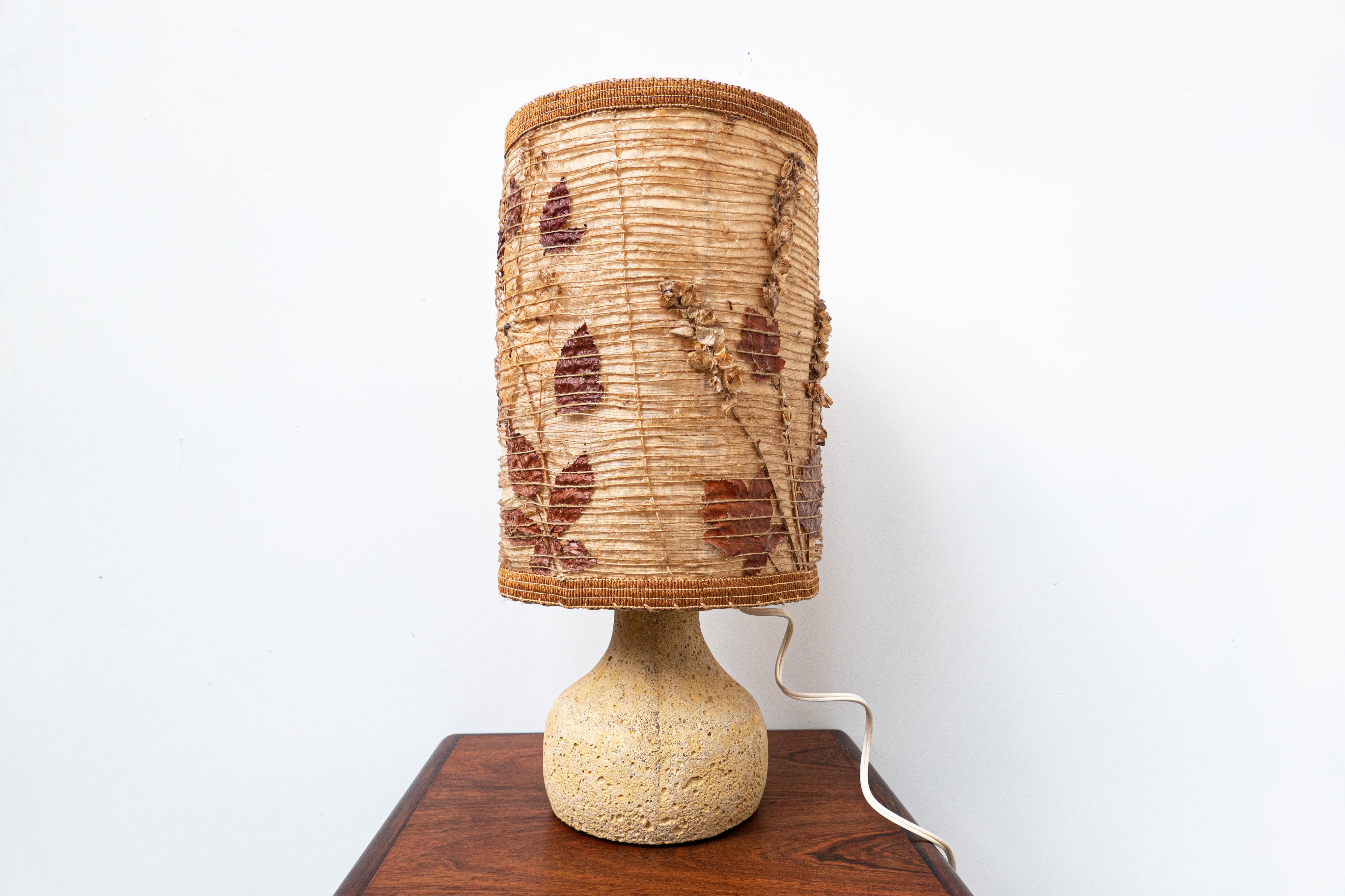 Mid-Century Modern travertine table lamp 1960s
The lampshade is orignal. Made of paper, leaves and rope.