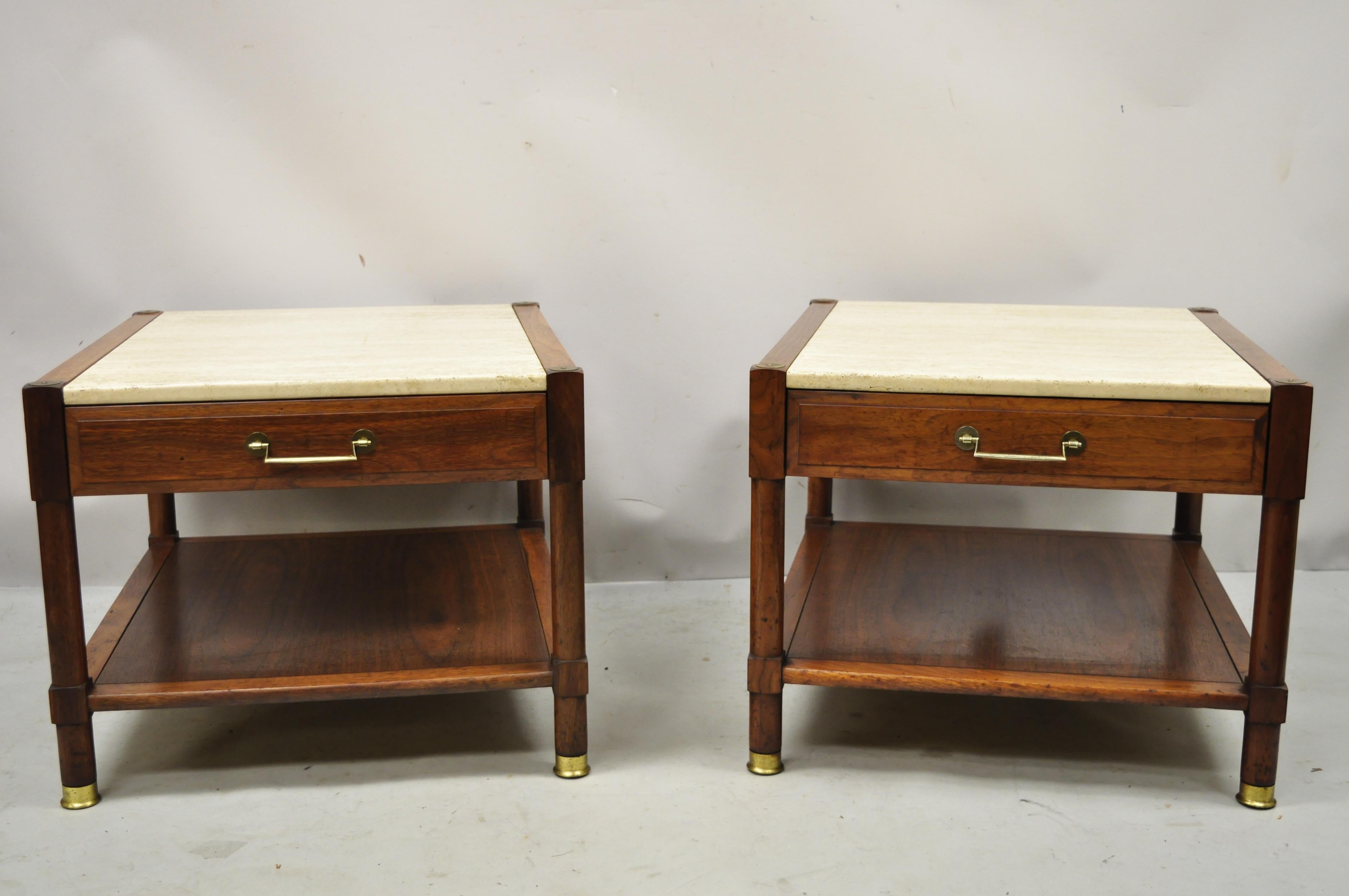 Mid Century Modern travertine stone top walnut 2 tier lamp side end tables - a Pair. Item features travertine stone top, brass capped feet, lower shelf, solid wood construction, beautiful wood grain, 1 dovetailed drawer, very nice vintage pair,