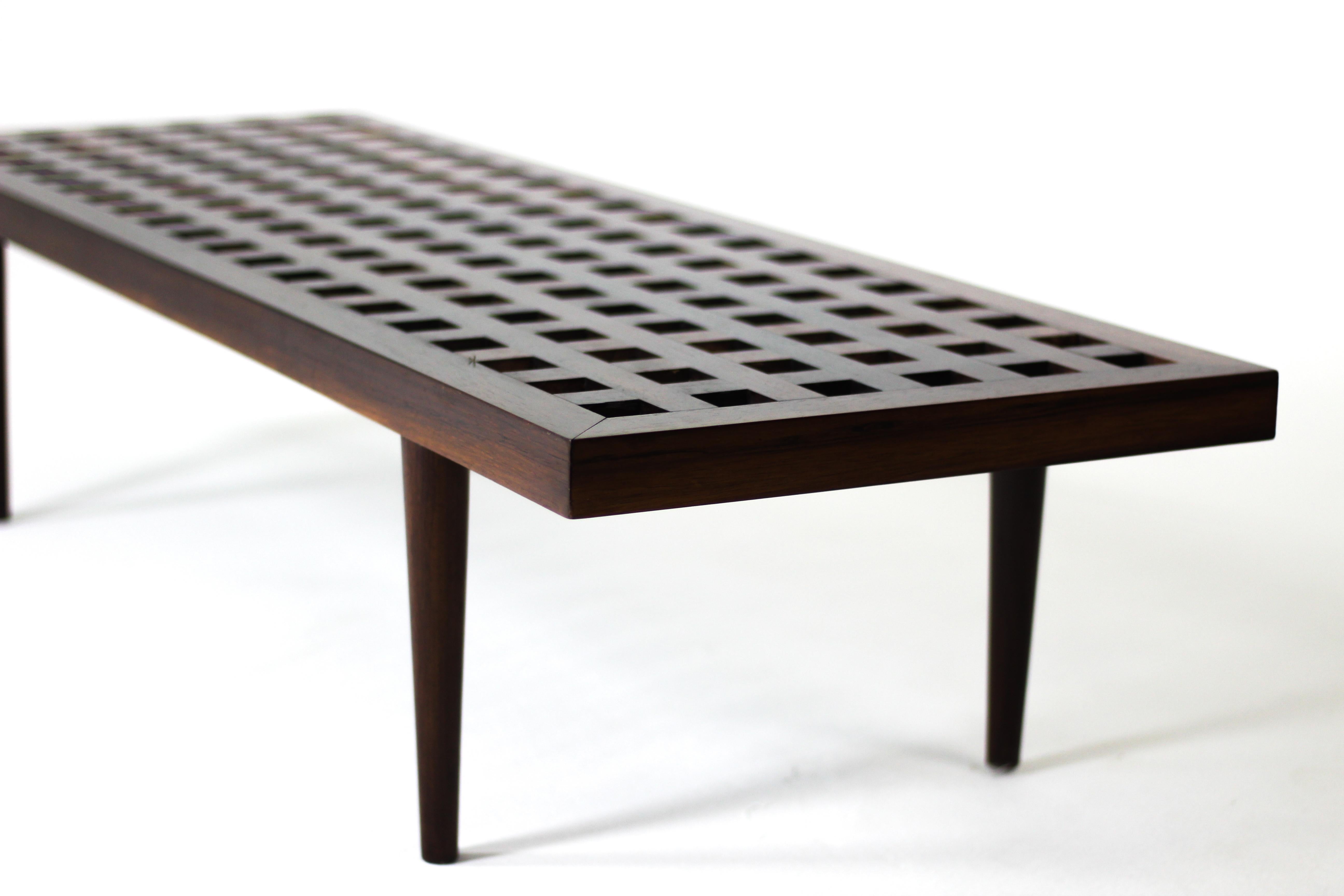 Mid-Century Modern Treliça bench/ coffee table by Joaquim Tenreiro, Brazil, 1950s.

The Treliça bench is a magnificent piece of furniture designed by the renowned Brazilian designer, Joaquim Tenreiro. 
Crafted during the mid-20th century, this bench