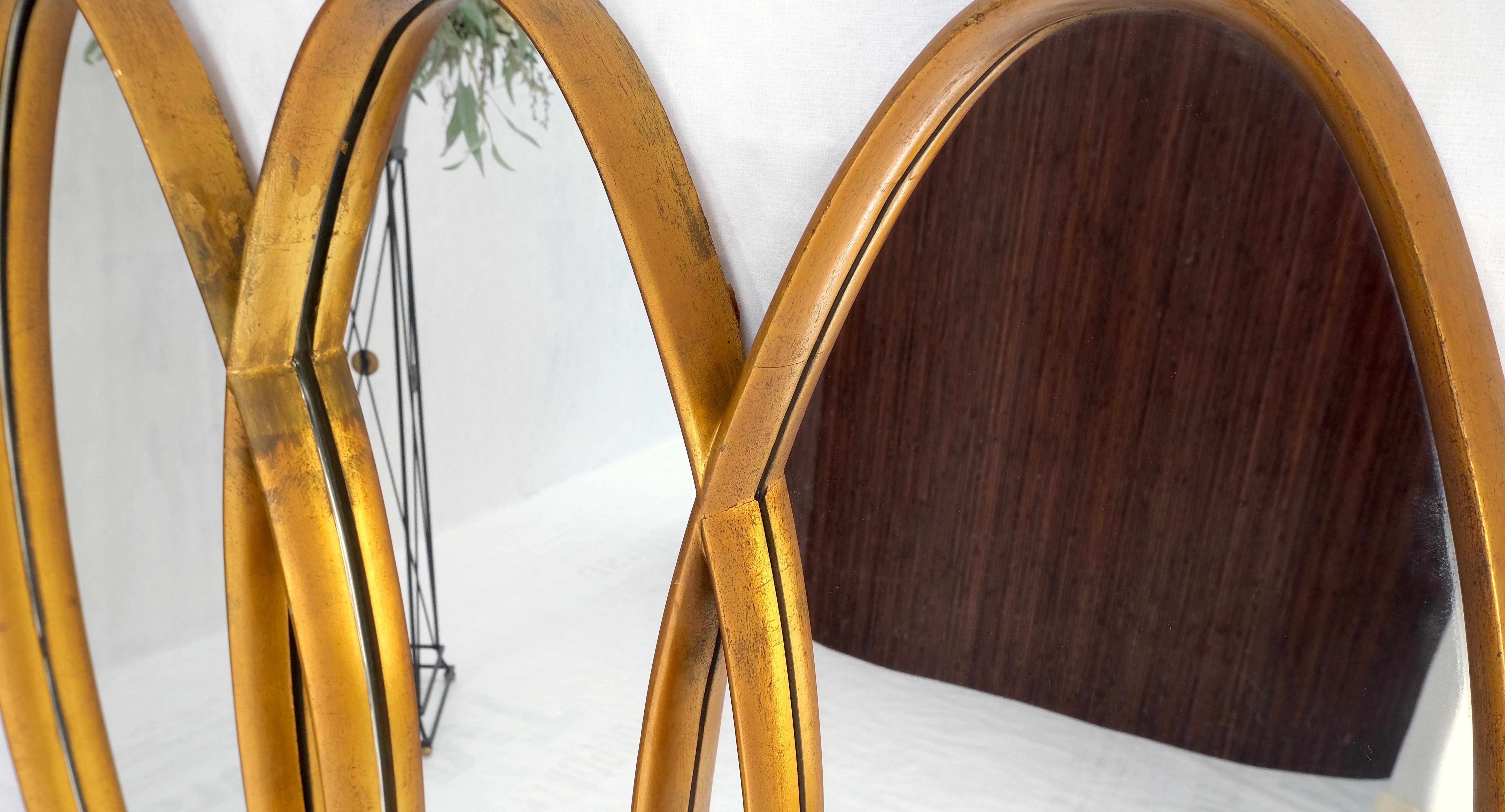 American Mid-Century Modern Tripple Overlapping Carved Wood Ovals Gold Gilt Wall Mirror For Sale