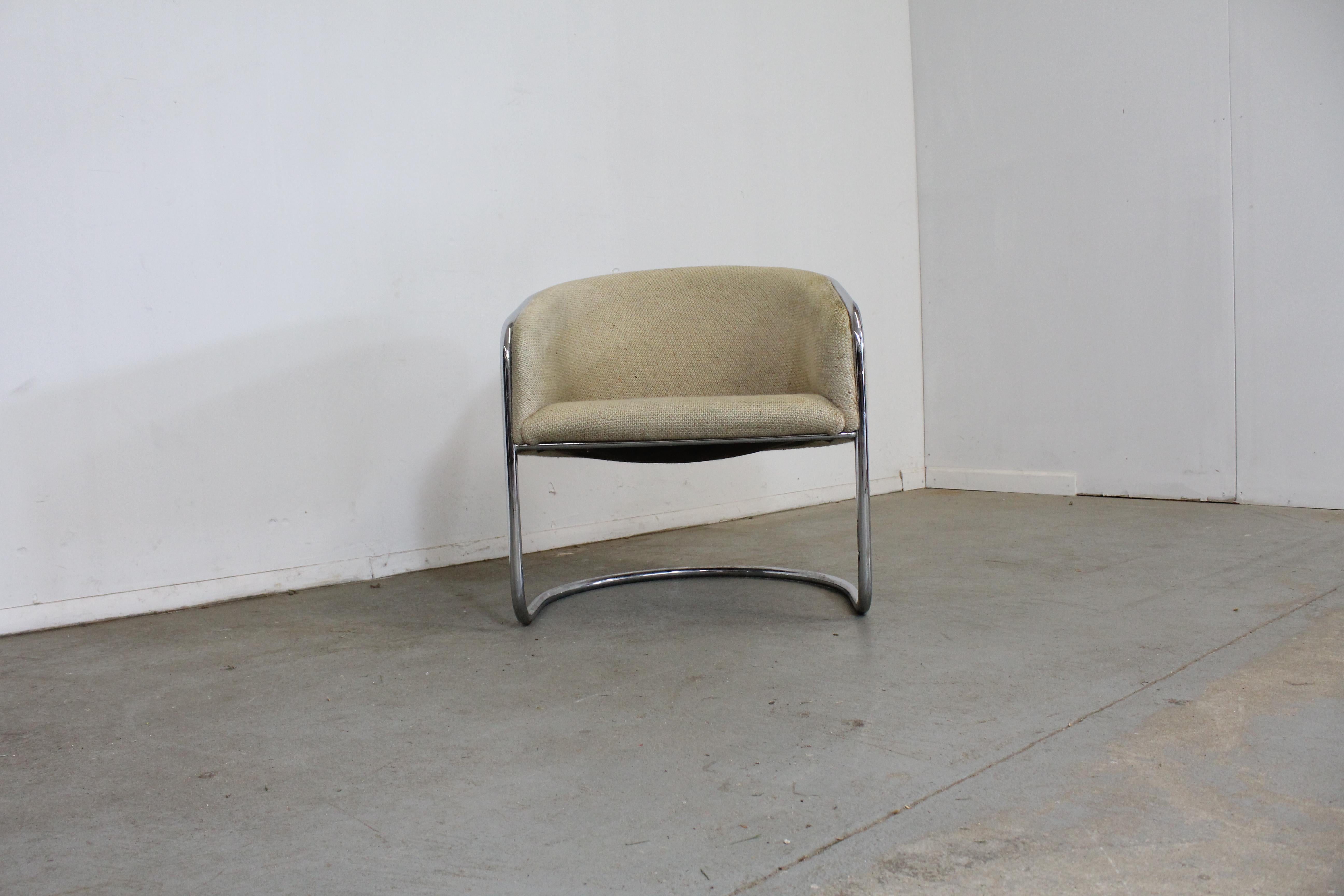 Mid-Century Modern tubular chrome accent chair

What a find. Offered is a vintage Mid-Century Modern chrome accent chair signed by Thonet Industries. It is structurally sound with staining on fabric and some patina on chrome. It should be