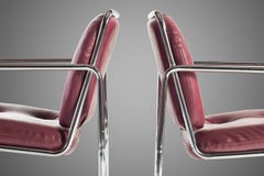 MCM Tubular Chrome Lounge Chairs by Chromcraft with Rich Oxblood Seats, c. 1960s