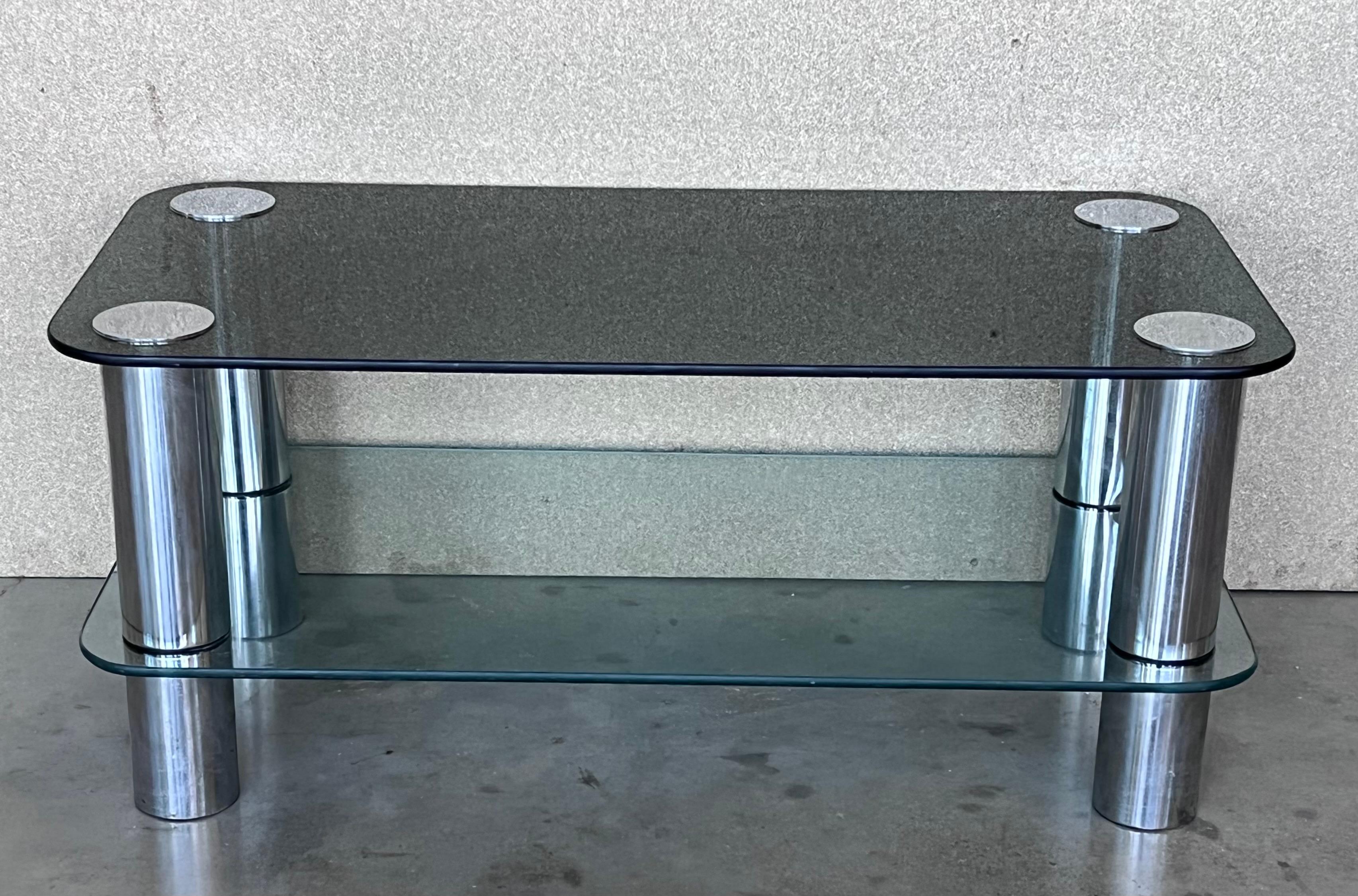 Mid-Century Modern chrome coffee table with smoked level up glass top and clear glass in low shelve. 

