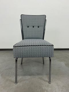 Mid-century modern tubular steel chair by Jozsef Peresztegi