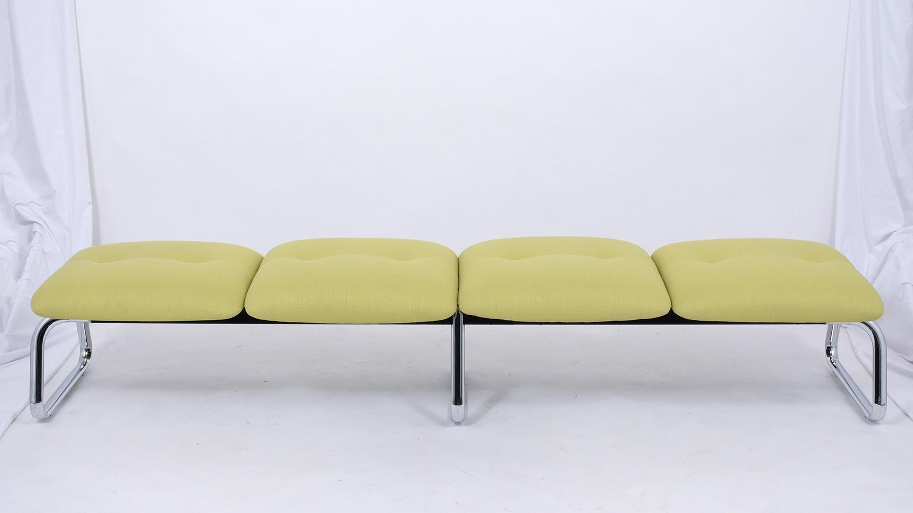 An eye-catching Mid-Century Modern Green Bench that features a four-seat design with tufted details and is newly restored by our team of craftsmen. Each seat is newly upholstered in a new green fabric with comfortable foam inserts and rests on a