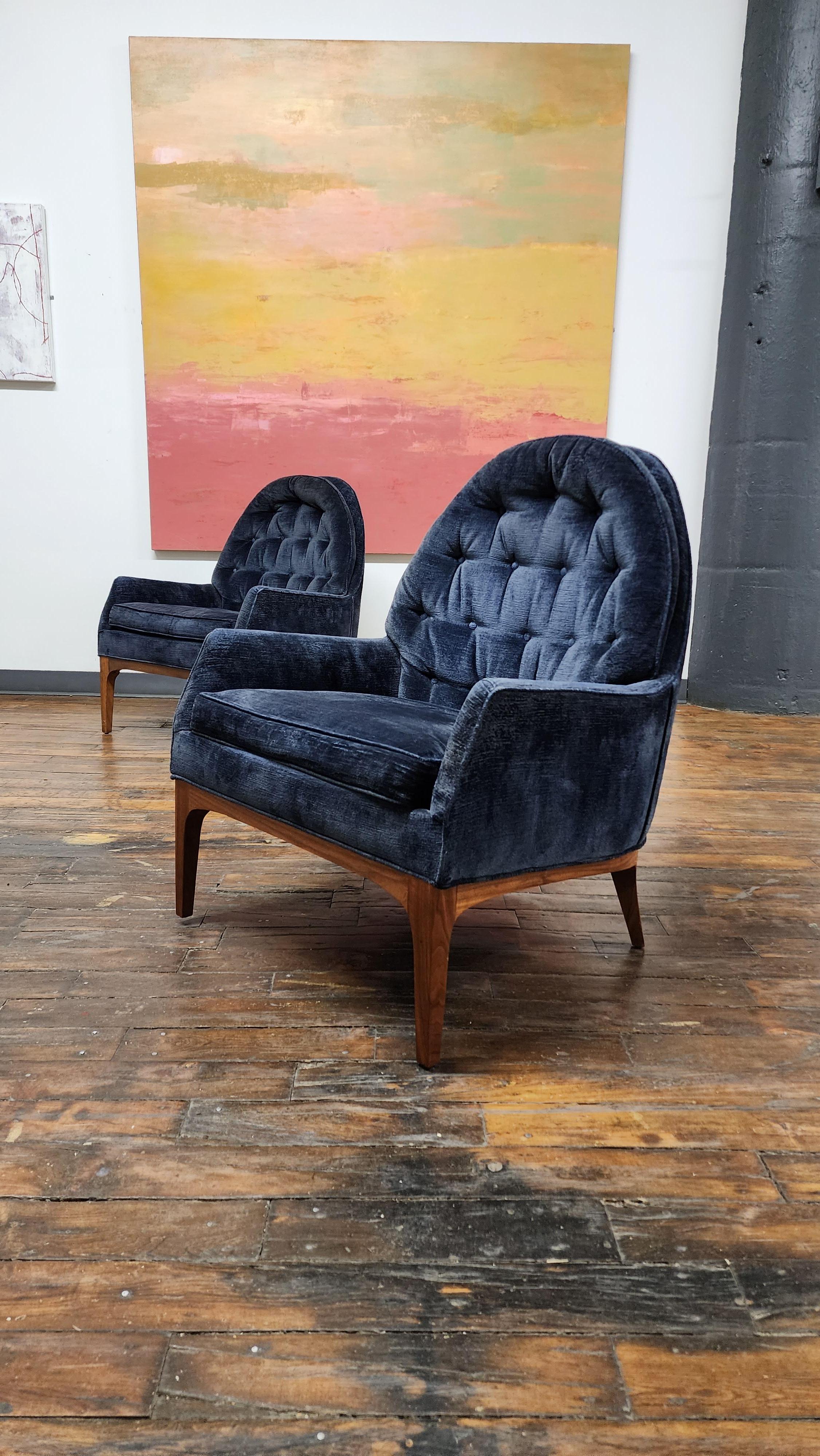 Beautiful pair of Mid-Century Modern club chairs. belived to be by the high end Mid-Century Modern furniture company Erwin Lambeth. manufactured in the 1960s. they have been reupholstered at some point likely in the 1990s with a beautiful blue