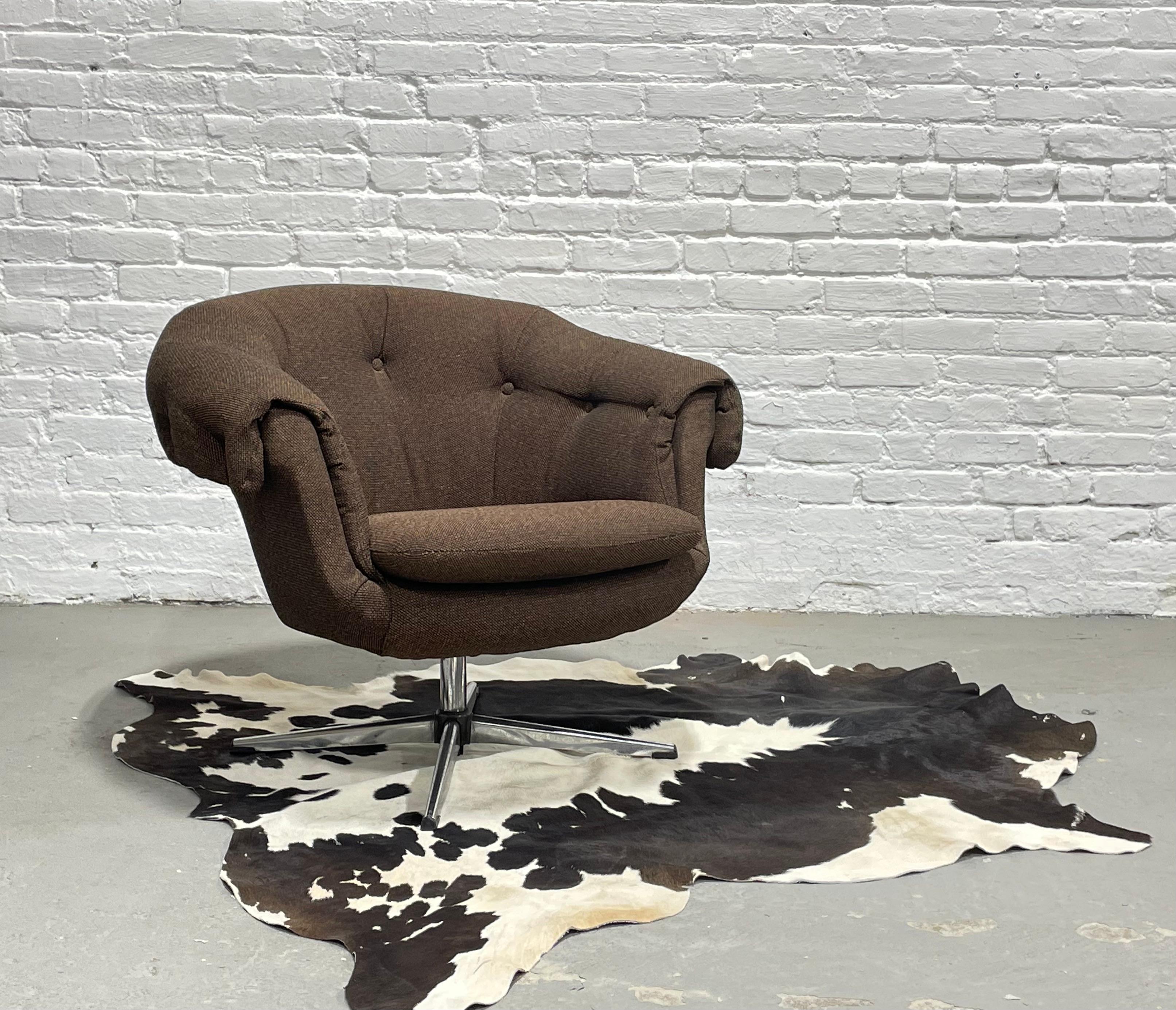 Mid-Century Modern molded styrofoam Tufted Overman pod chair upholstered in lovely textured brown fabric with matte chrome base. Chair swivels and is super comfortable. Lovely neutral brown color that is easy to match with most anything. Lightweight