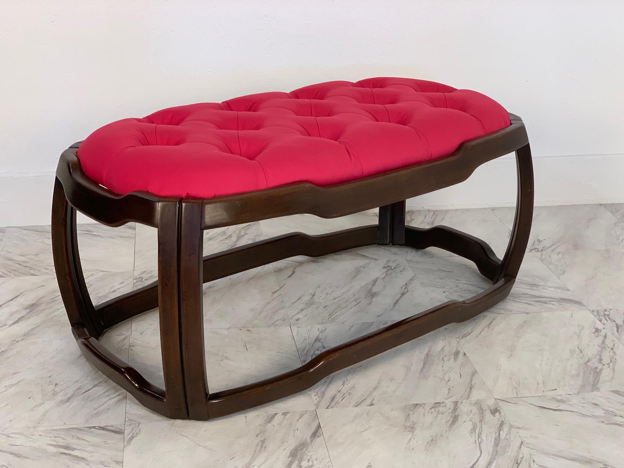 Mid-Century Modern Asian style tufted upholstered bench. The bench has a solid mahogany frame with an upholstered tufted seat cushion.