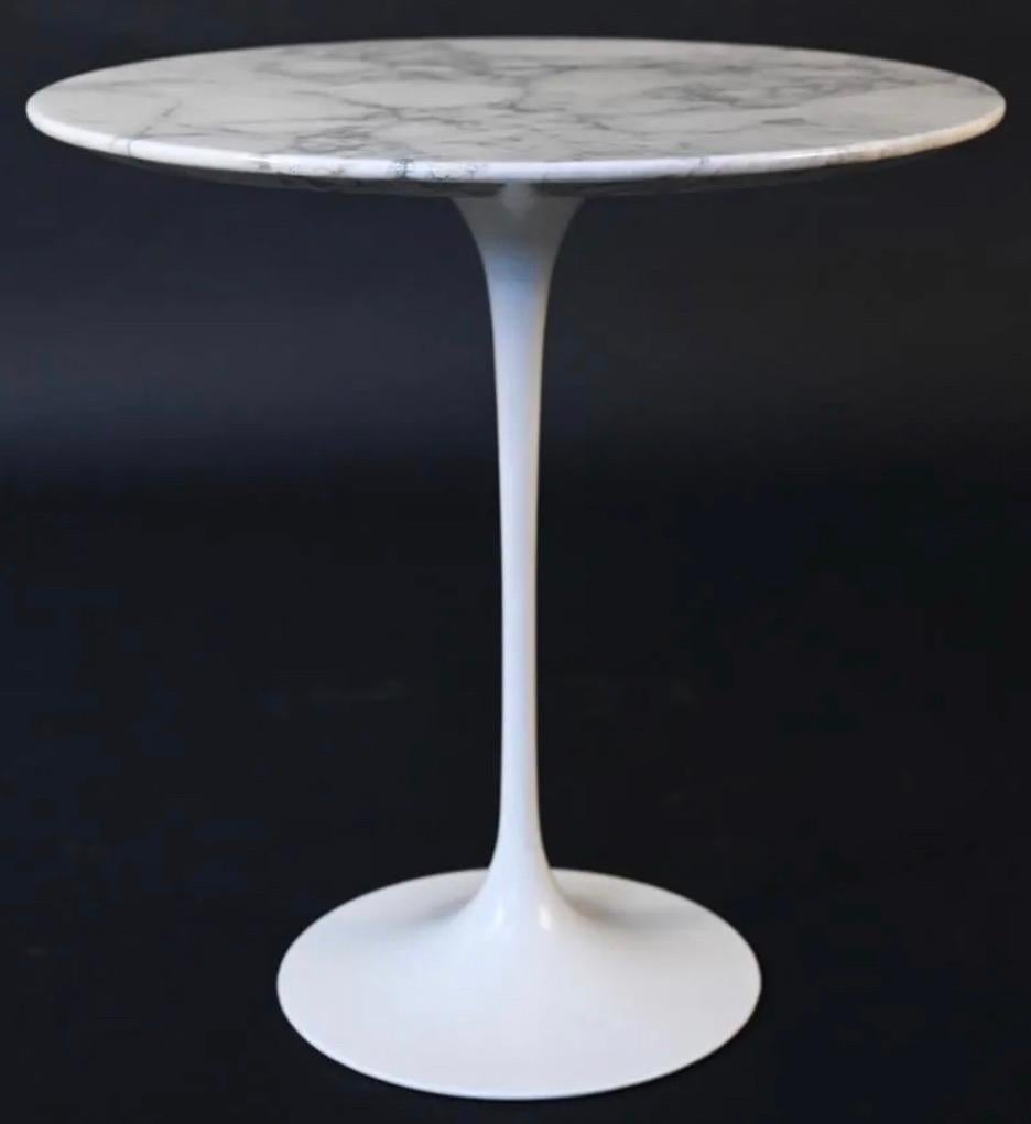 Circular gray and white marble top on lacquered metal base, in the manner of Knoll. Wonderful as end table, side table or occasional table.

 