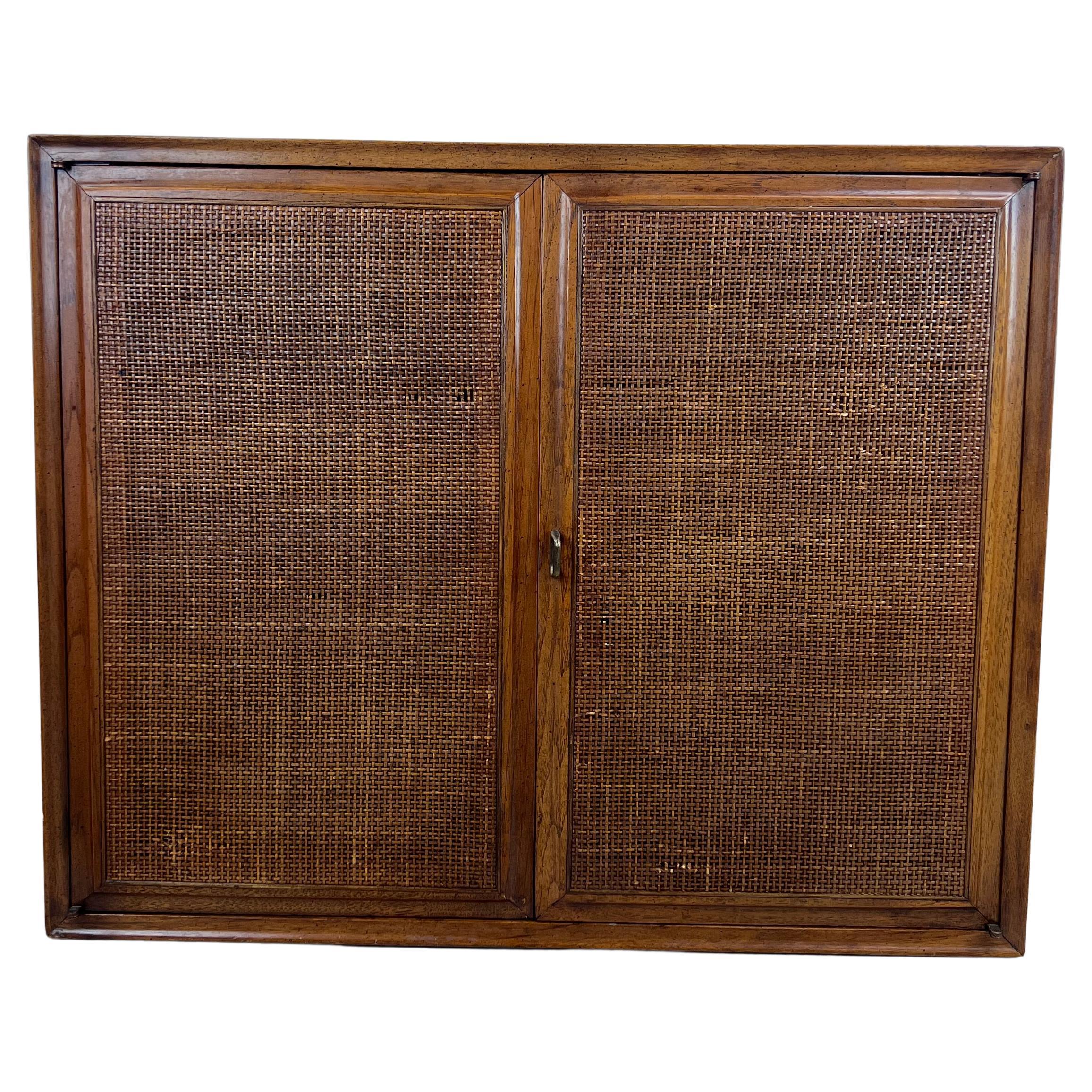 Mid Century Modern Two Door Cabinet with Adjustable Shelving & Cane Doors For Sale