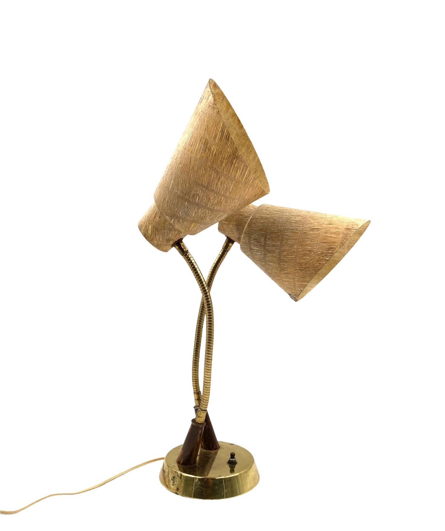 Mid-century modern two lights lamp 

France circa 1960

Brass, wood, fiberglass

H 56 cm Diam. 31 cm

Conditions: good consistent with age and use. Little damage on one shade