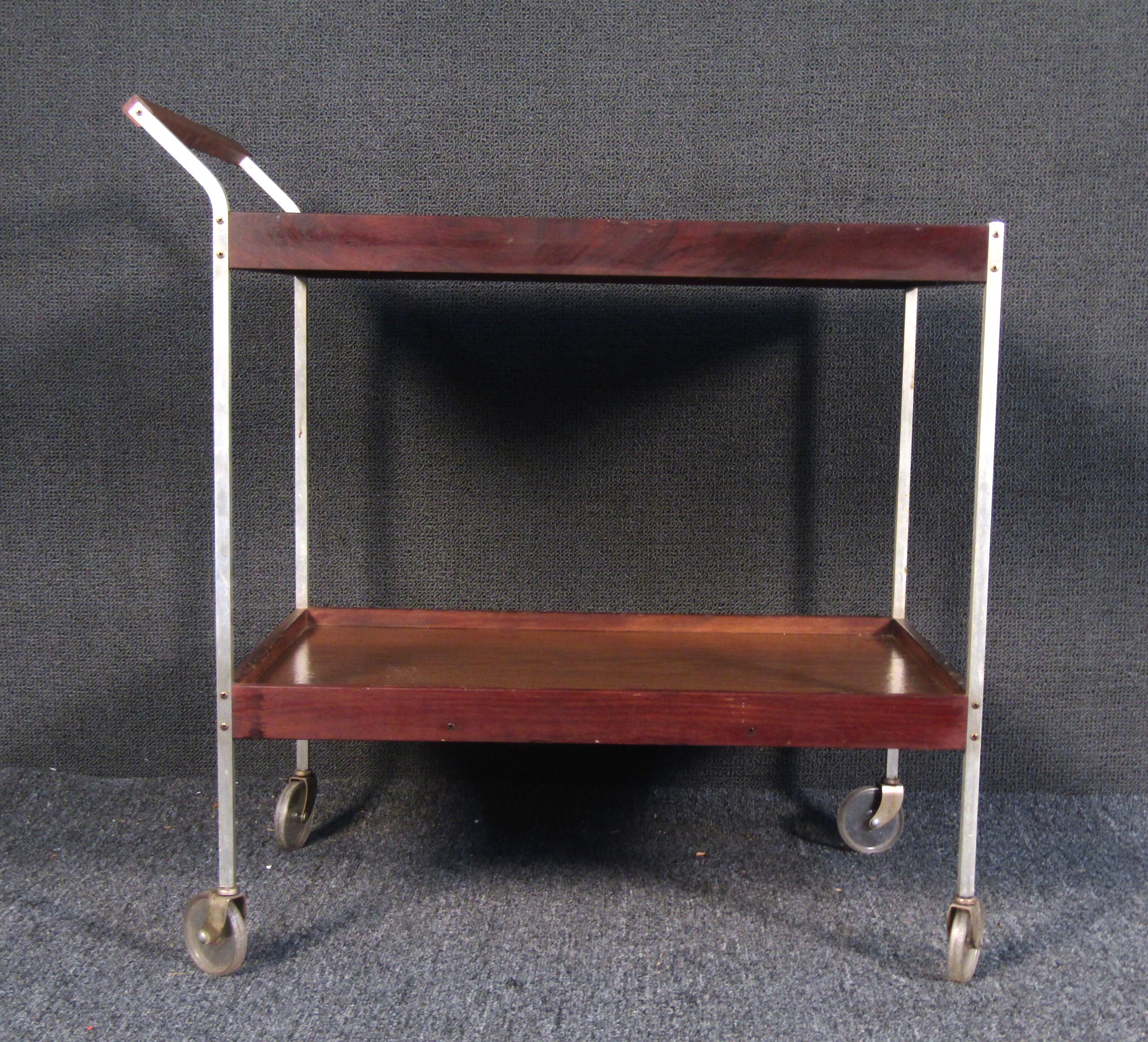 Vintage modern buffet cart with hot glass. This sleek Salton cart features two tiers and has four wheels. Perfect for serving food at your weekend brunch parties.

Please confirm item location (NY or NJ).
