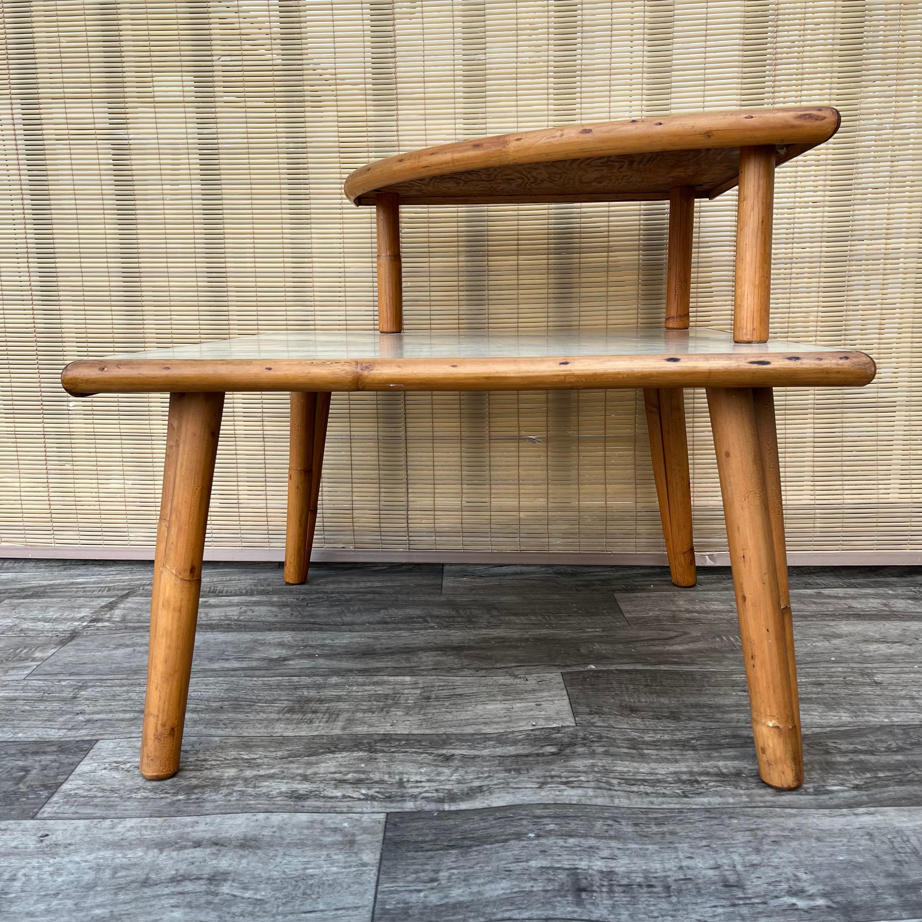 Mid Century Modern Two Tiered Rattan Corner Table. Circa 1950s In Good Condition For Sale In Miami, FL