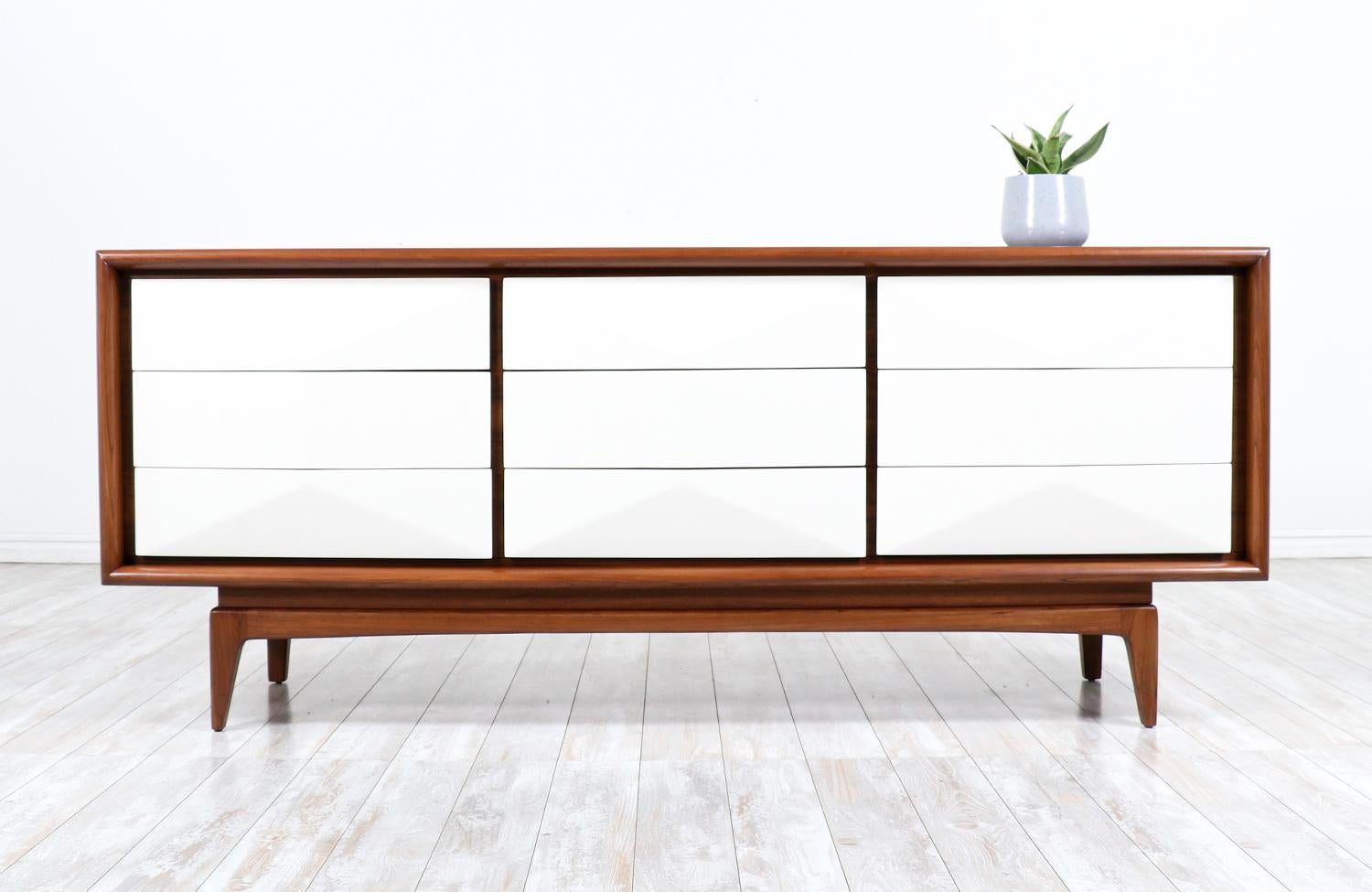 Mid-Century Modern two-toned lacquered & walnut dresser by United Furniture.

________________________________________

Transforming a piece of Mid-Century Modern furniture is like bringing history back to life, and we take this journey with passion