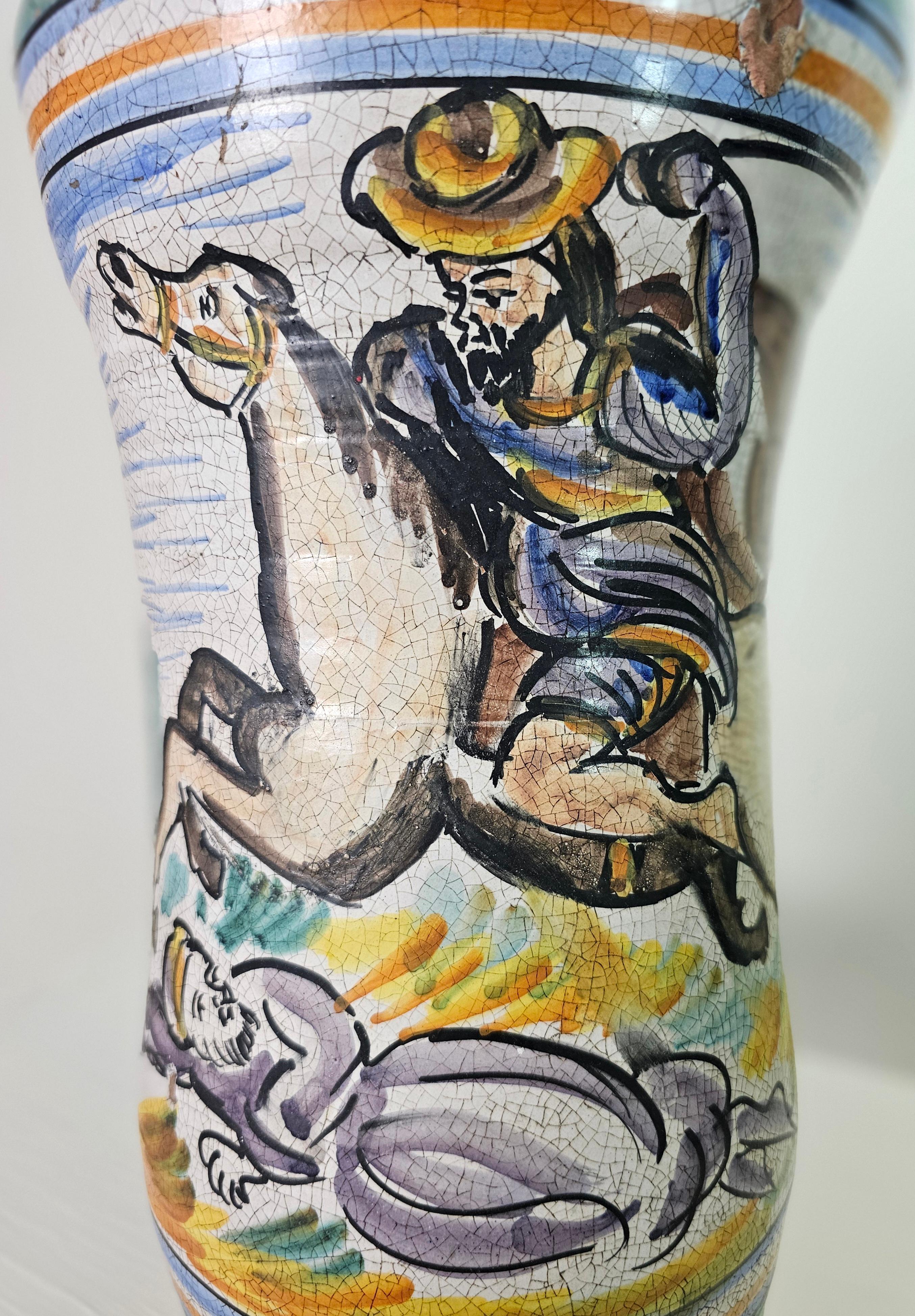 Vase, umbrella stand in polychrome ceramic with signature G.R. Caltagirone. Made and decorated by hand by master craftsmen. Italian production circa 1950. Please watch the video and photos carefully, thank you.

Weight: 7,500 Kg
Mouth diameter: 19