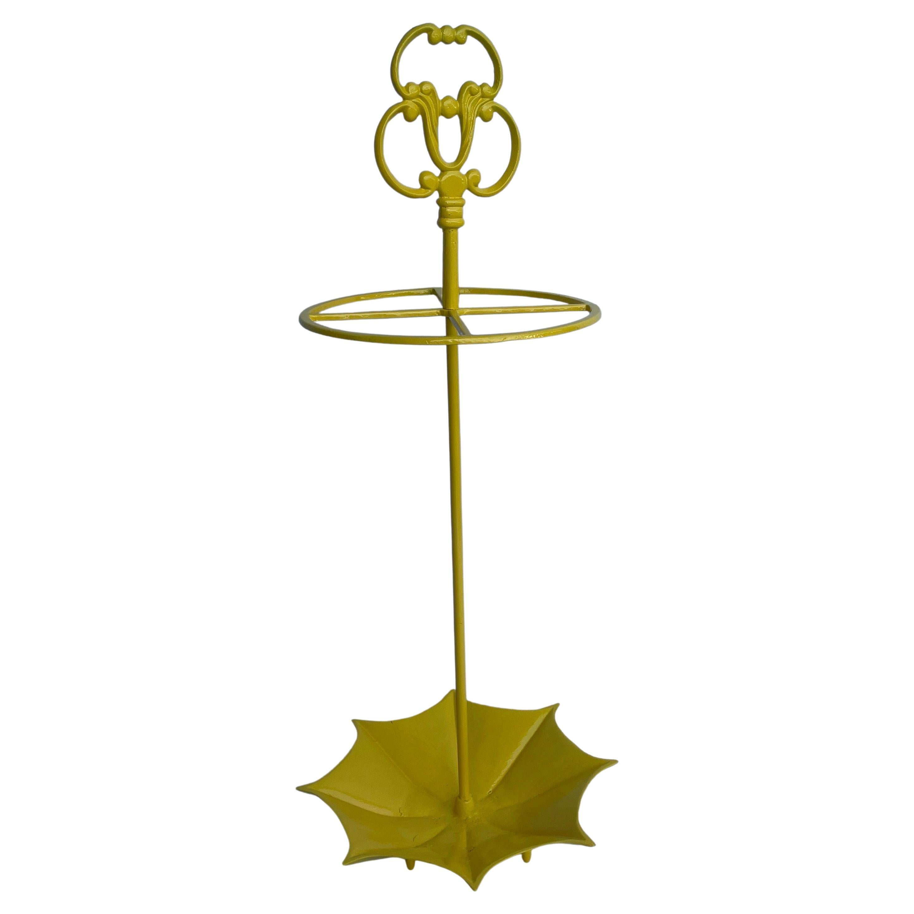 Powder-Coated Yellow Umbrella Stand Holder, MCM

Substantial vintage metal umbrella stand in newly powder-coated Sunshine Yellow. This is a perfect sturdy piece to be used by the front door as well as mud room area. This also makes a wonderful