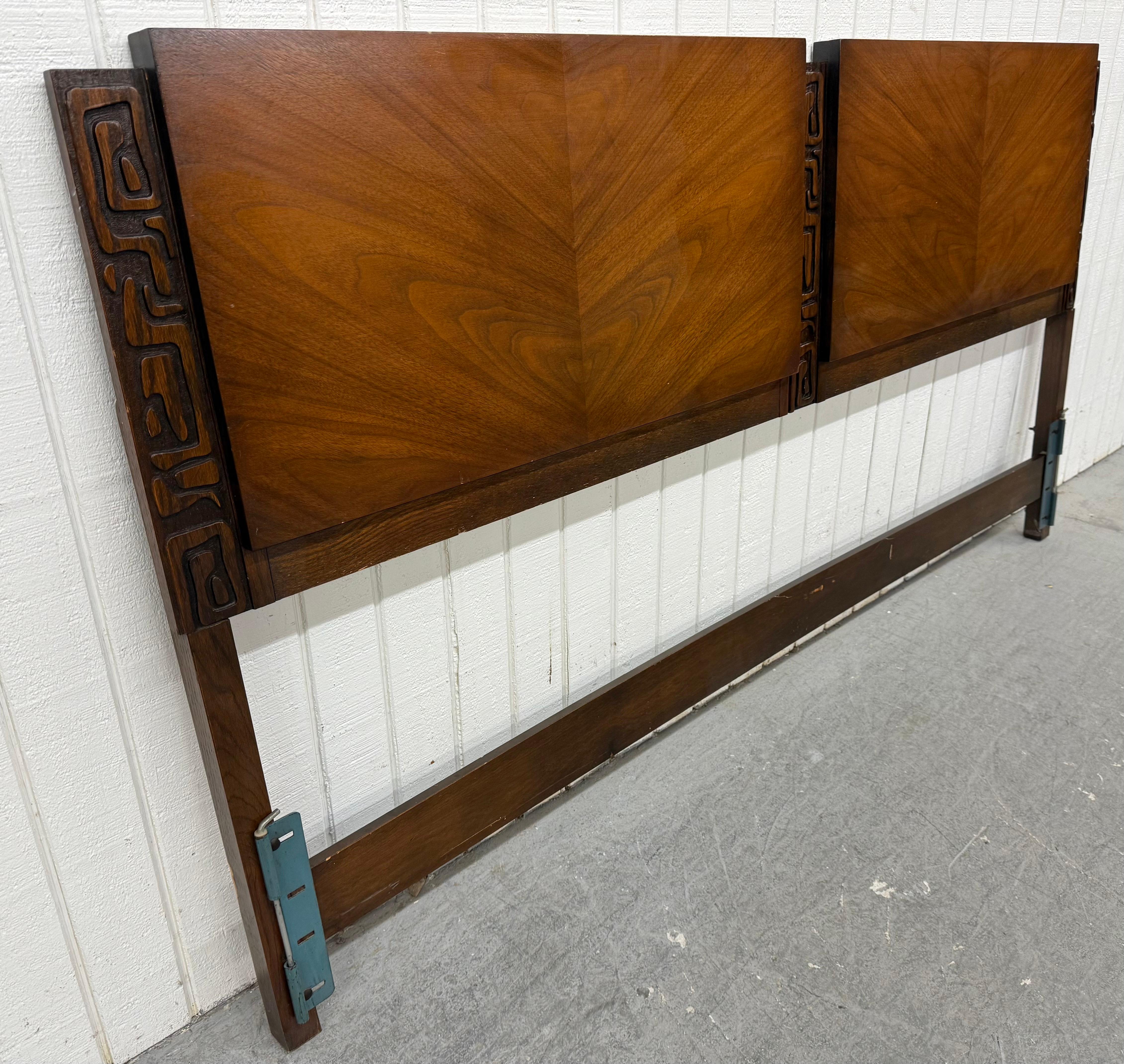 This listing is for a Mid-Century Modern United Tiki Walnut King Headboard. Featuring a straight line Tiki style design, carved accents, and beautiful walnut finish. This is an exceptional combination of quality and design by United!