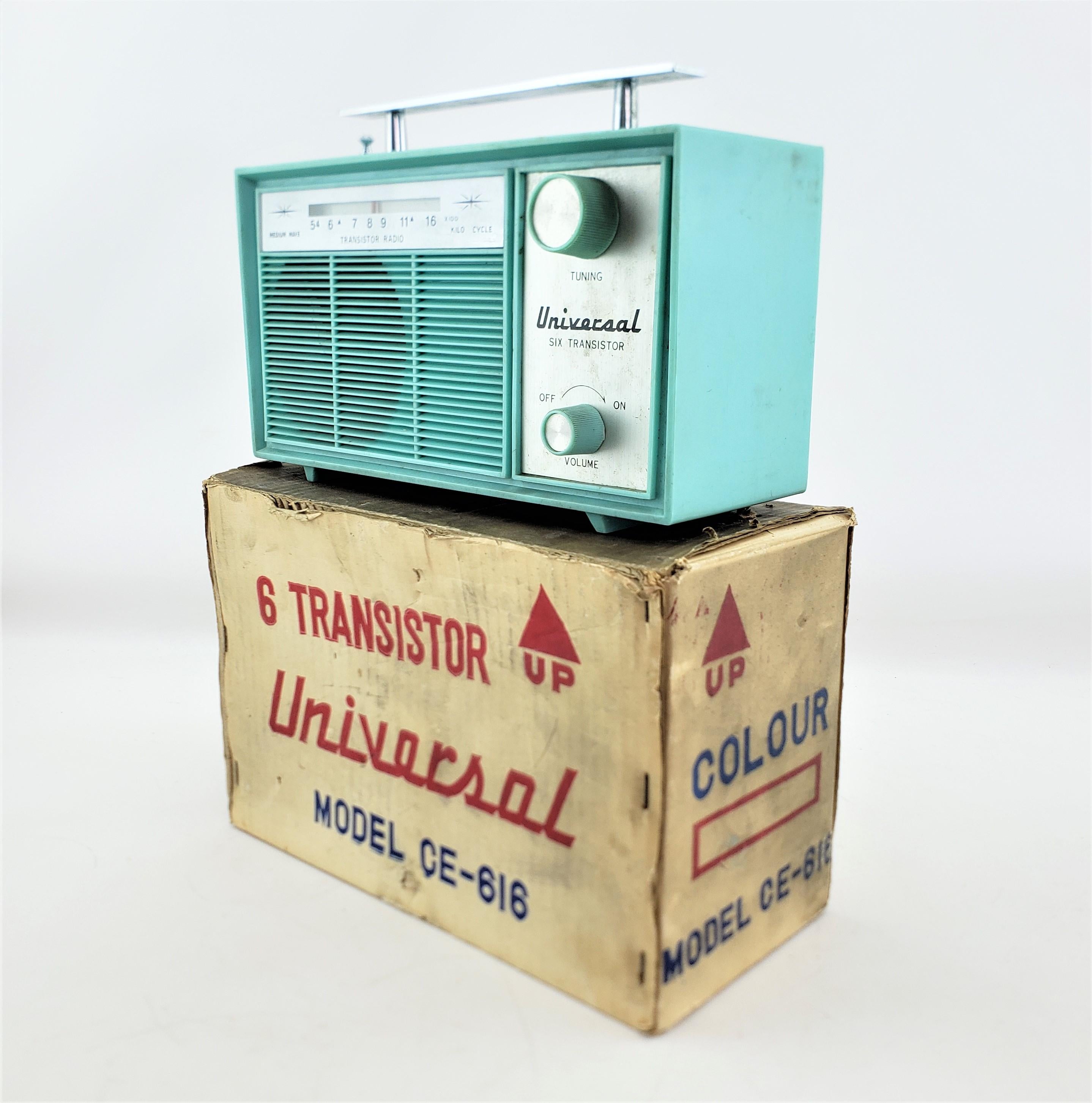 This radio was made by Universal of Canada and dates to approximately 1965 and done in the period Mid-Century Modern style. This radio is a six transistor AM band portable radio done with a turquoise plastic molded case and comes complete with its
