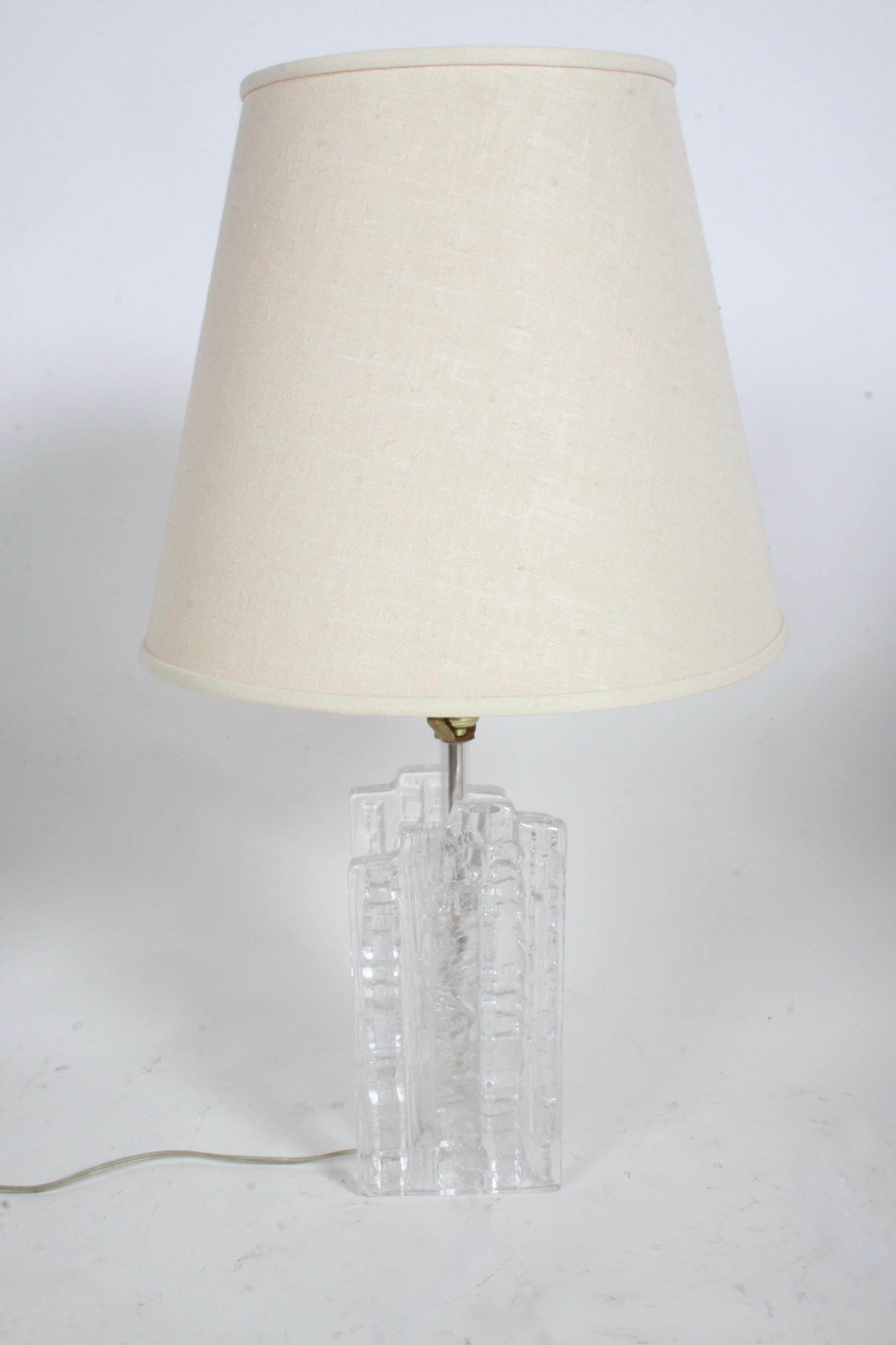 Scandinavian Modern Uno Westerberg for Pukeberg table lamp with textured and sculpted glass that resembles ice cubes, Sweden, circa 1960s. Label intact. Shade not included. Three-way socket. Measure: 24.25