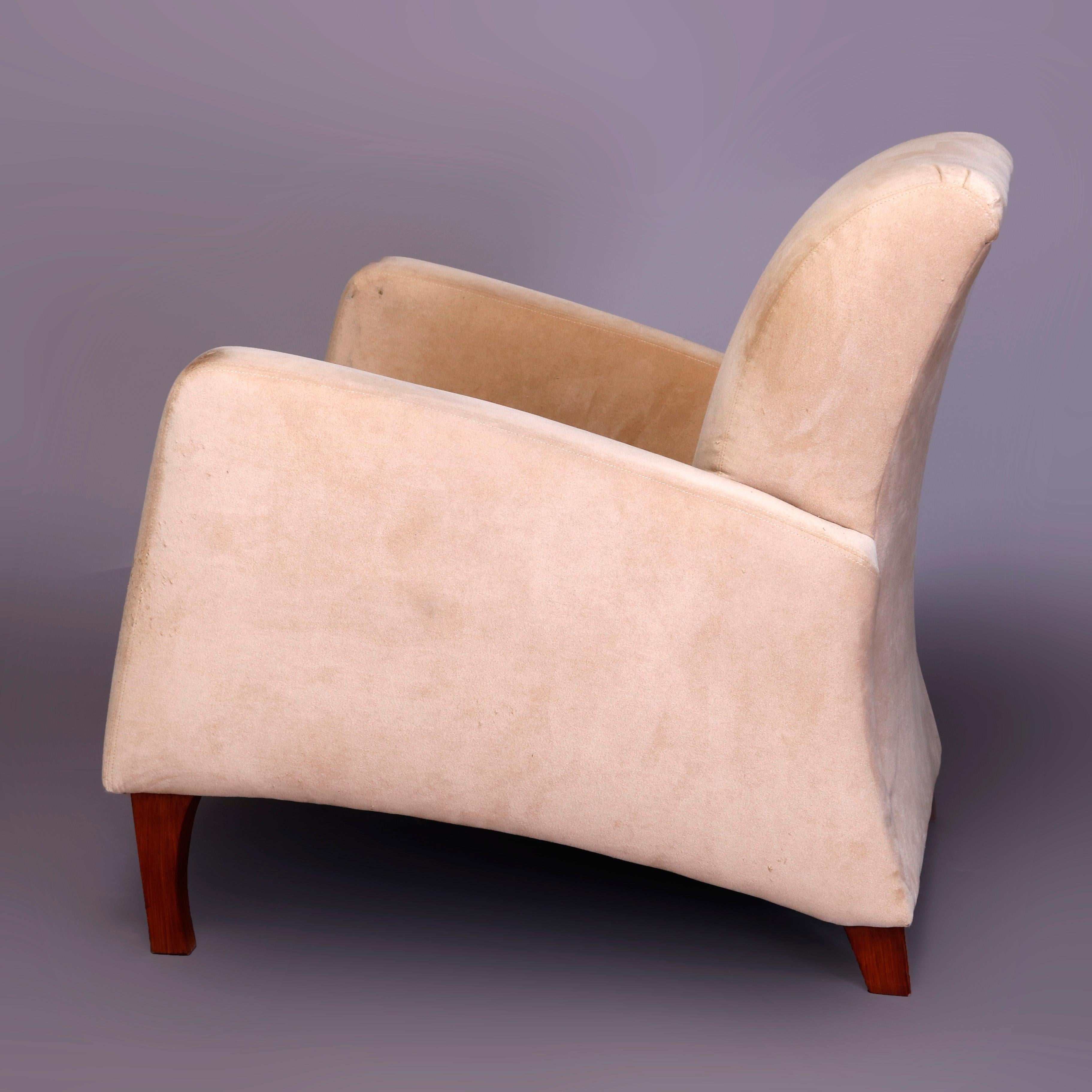 A Mid-Century Modern lounge armchair in the manner of Paolo Buffa, Italy offers slightly reclined form raised on squared bowed teak legs, mid-20th century

Measures: 30.5