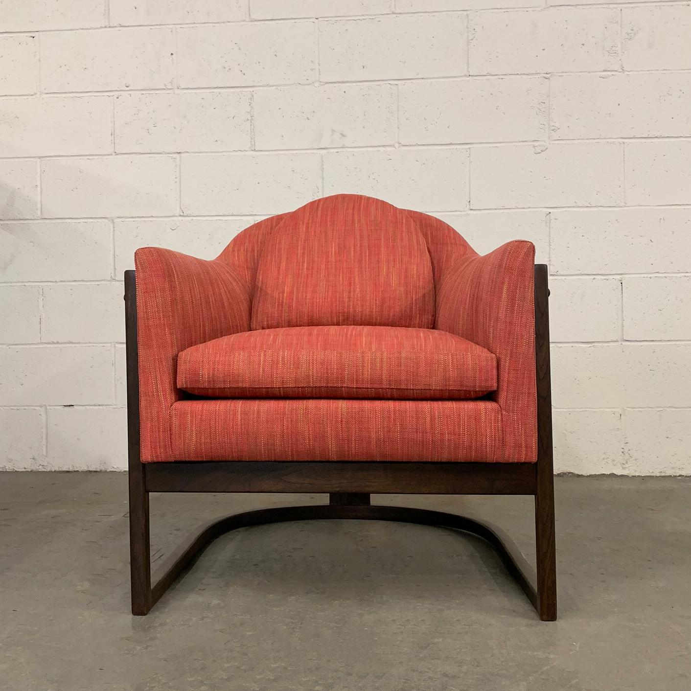 Mid-Century Modern, club chair attributed to Harvey Probber features a round, barrel shape, walnut frame with rosewood trim is newly upholstered in a raspberry tweed, cotton linen blend.