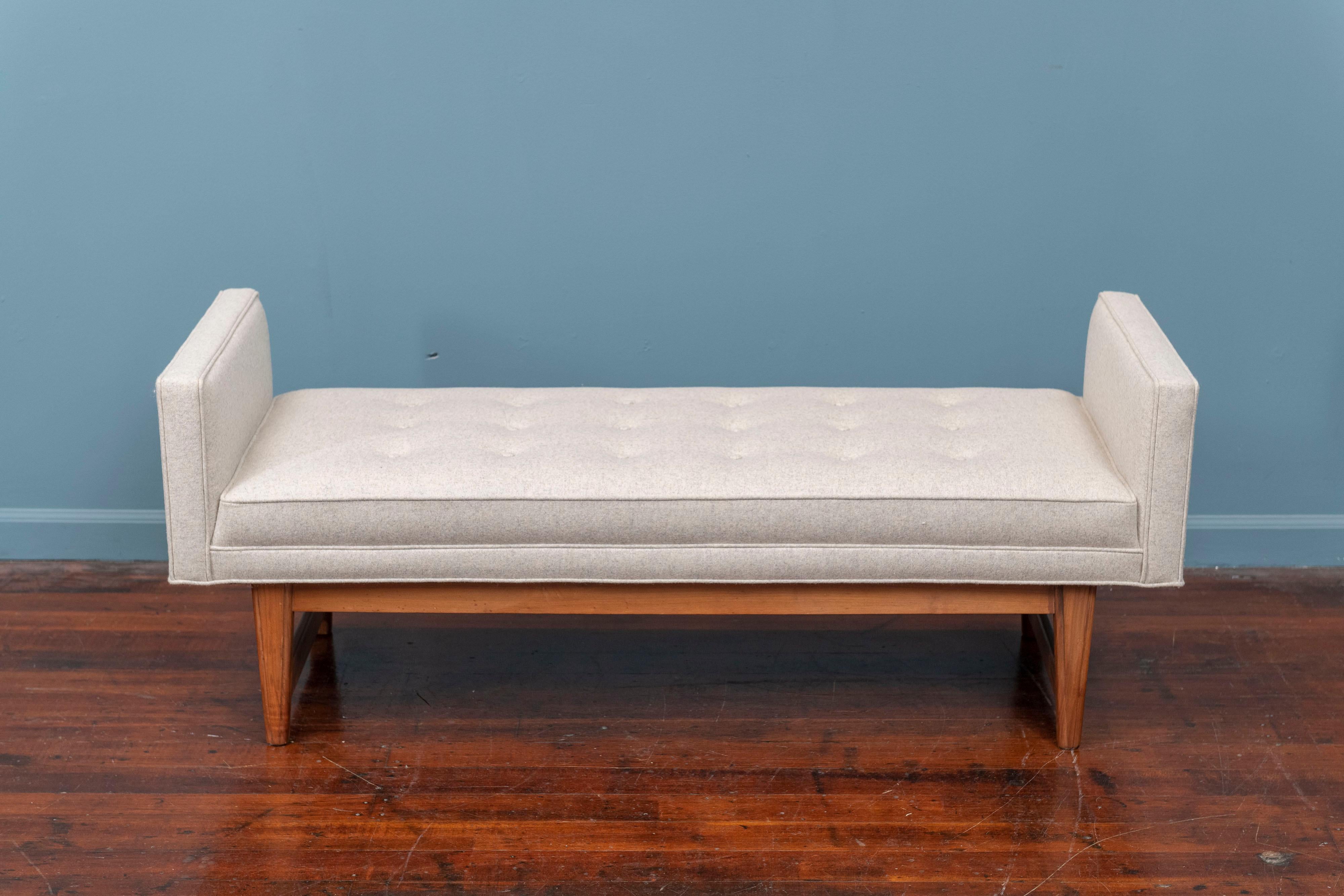 Mid-Century Modern bench by Selig, newly upholstered in a light gray/oatmeal wool felt on a walnut frame. In very good condition and ready to install, perfect for the end of the bed.