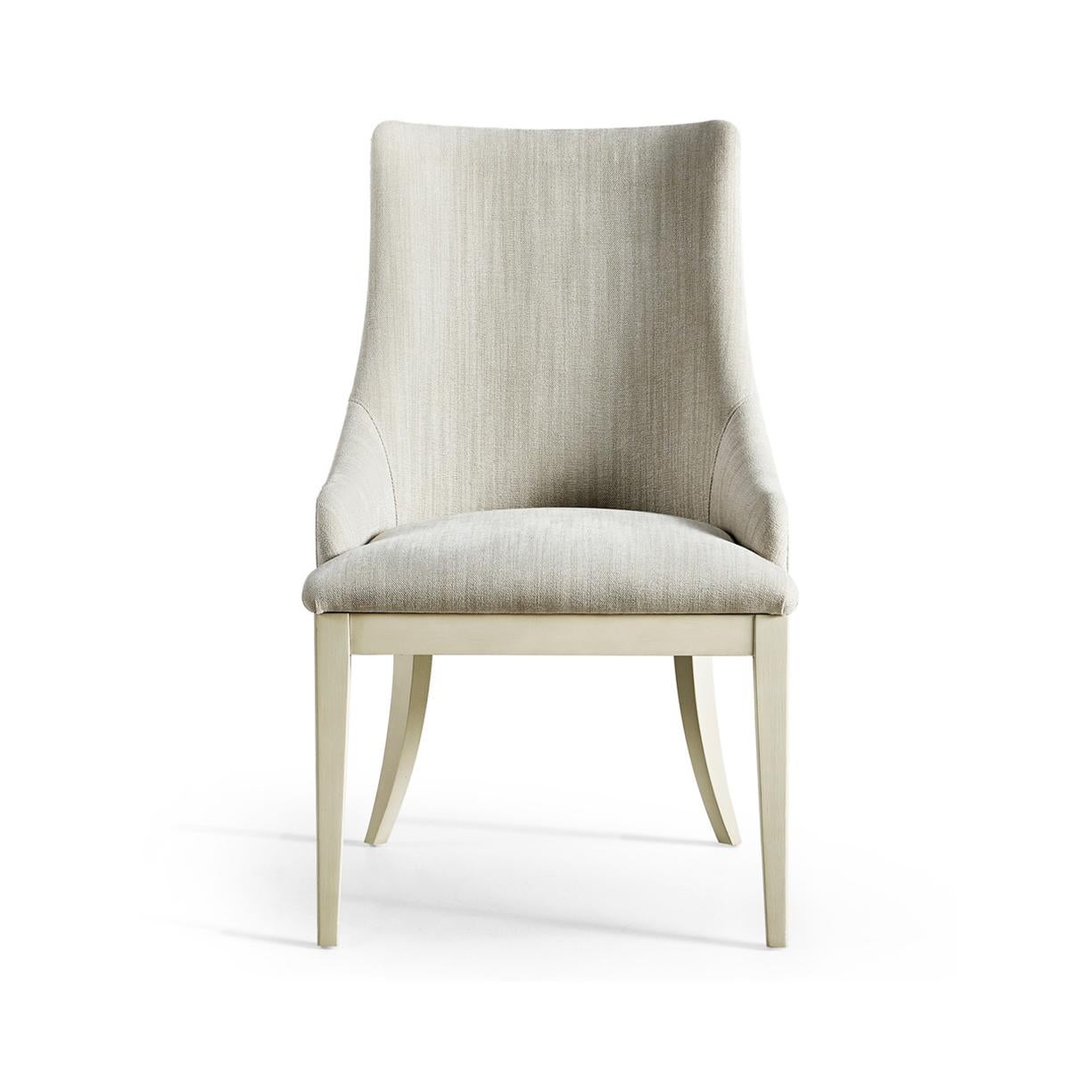 Mid-Century Modern upholstered side chair is perfectly proportioned, exuding timeless elegance and modern sophistication. With a gently sloping back fully upholstered in pristine performance fabric, offering unparalleled refinement.

A lightly