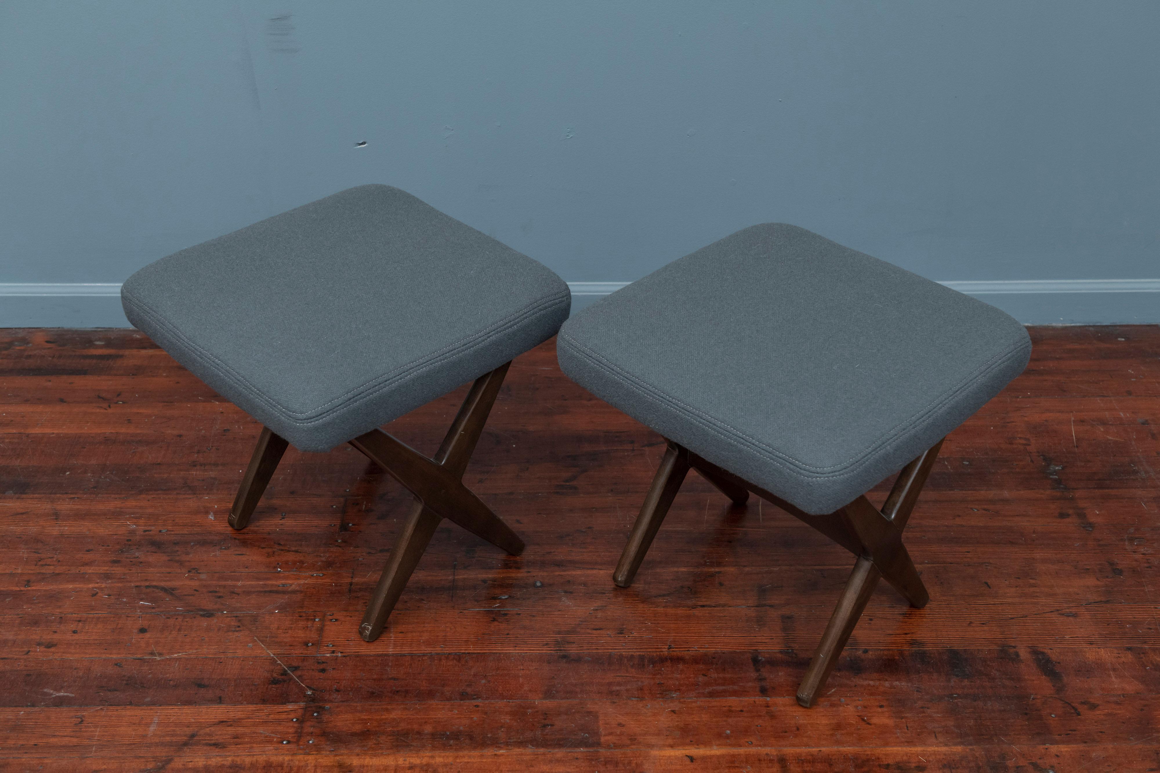 Folke Ohlsson for DUX stools with new teal wool upholstered seats on fruitwood X-form bases.