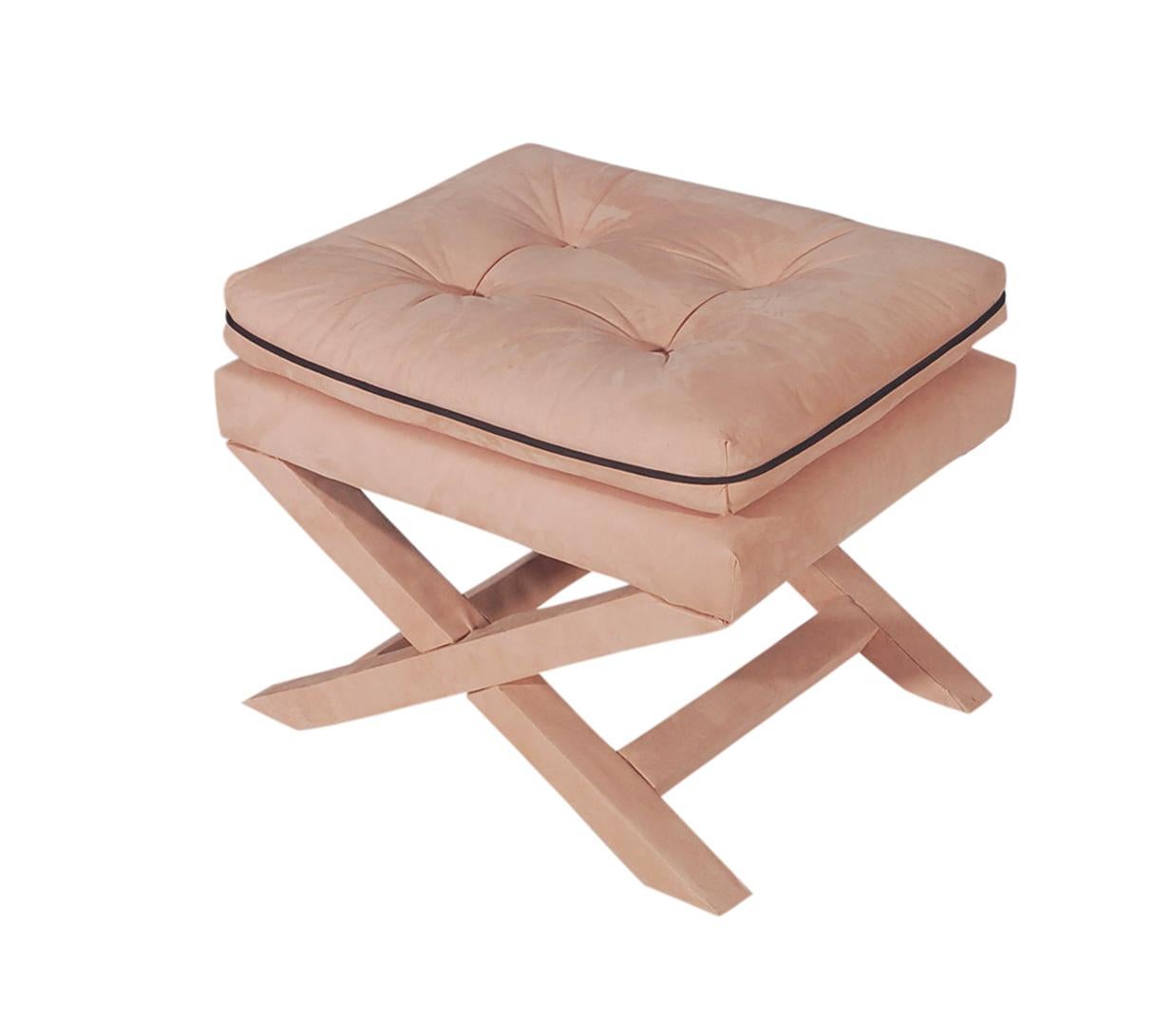 A beautiful matching set of X benches designed by Billy Baldwin. These are upholstered in powder pink ultrasuede. Nice clean usable condition.