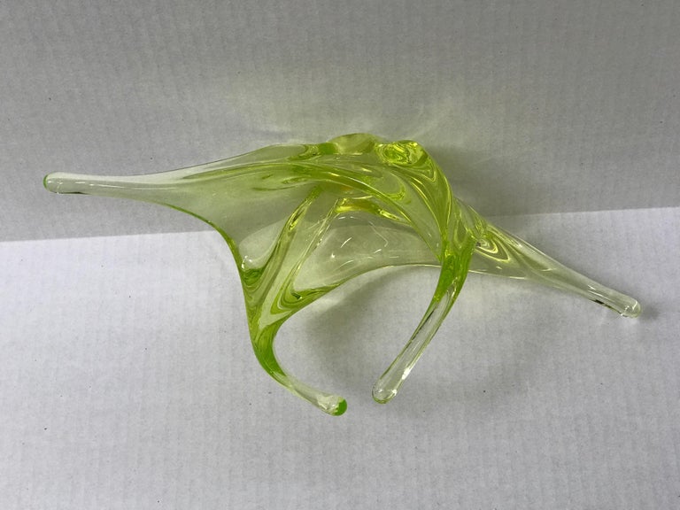 REDUCED FROM $380....Mesmerizing, modern and surreal midcentury form from Val St. Lambert, Belgium’s foremost glass studio. This uranium glass asymmetrical bowl with a radiating design is astonishing in both its form and color. Exhibits part of