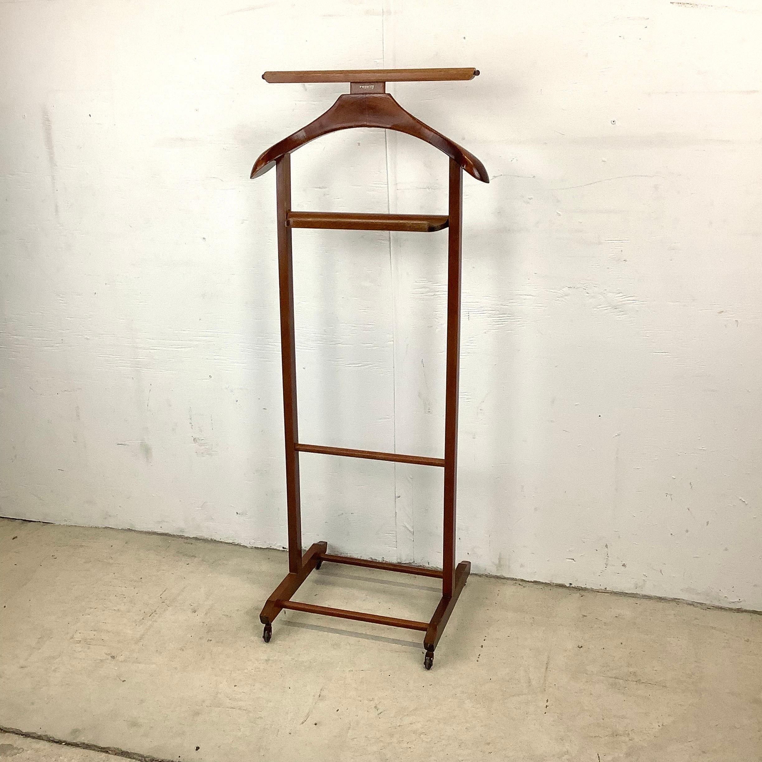 This freestanding vintage valet makes a perfect accessory for dressing areas or bedroom- marked by the manufacturer Fratelli Reguitti with design attributed to famed mid-century Italian designer Ico Parisi. This simple yet practical valet stand adds