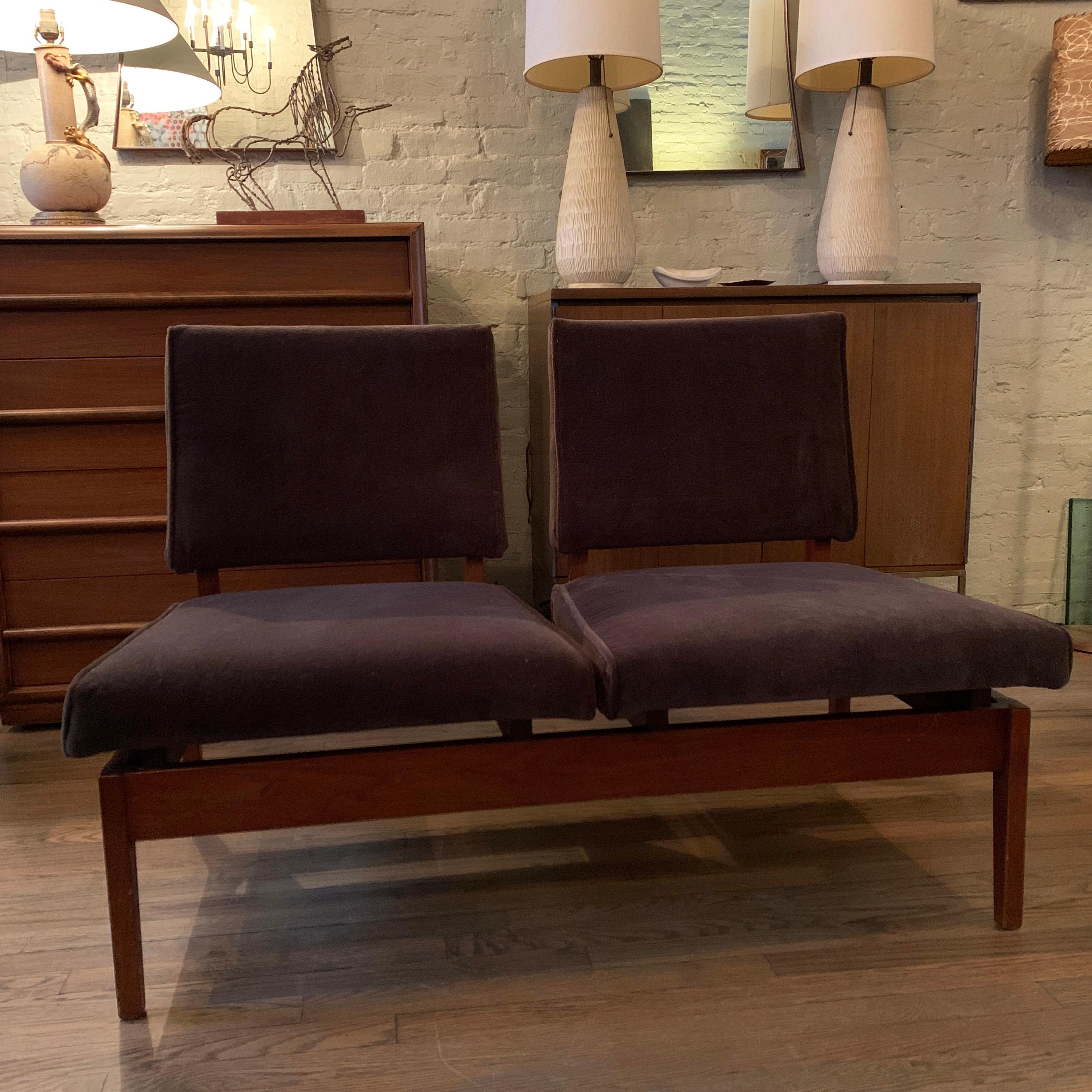 Mid-Century Modern, settee or loveseat features a floating walnut frame with chocolate brown velvet upholstery.