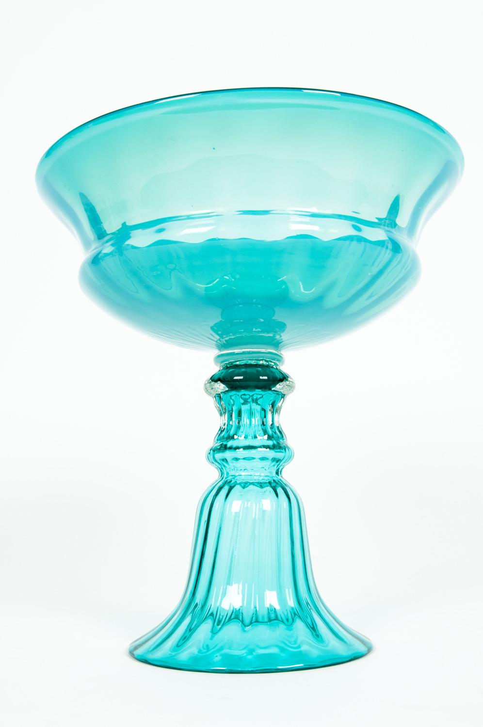 Mid-Century Modern turquoise color Venetian glass decorative centerpiece. The piece is in excellent condition. The centerpiece measure about 12.5 inches high X 12 inches diameter.